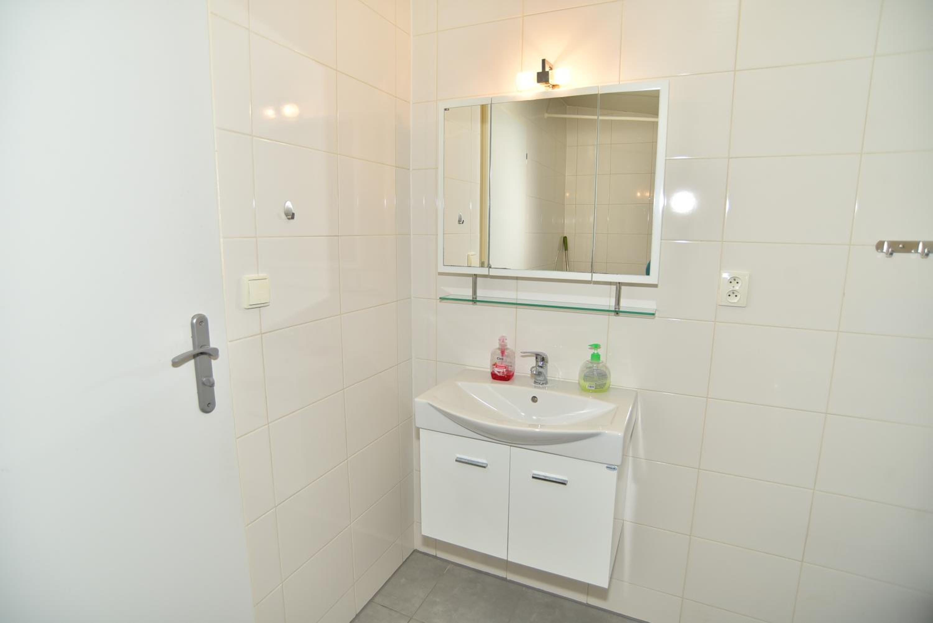Three-Bedroom Apartment - Photo 38