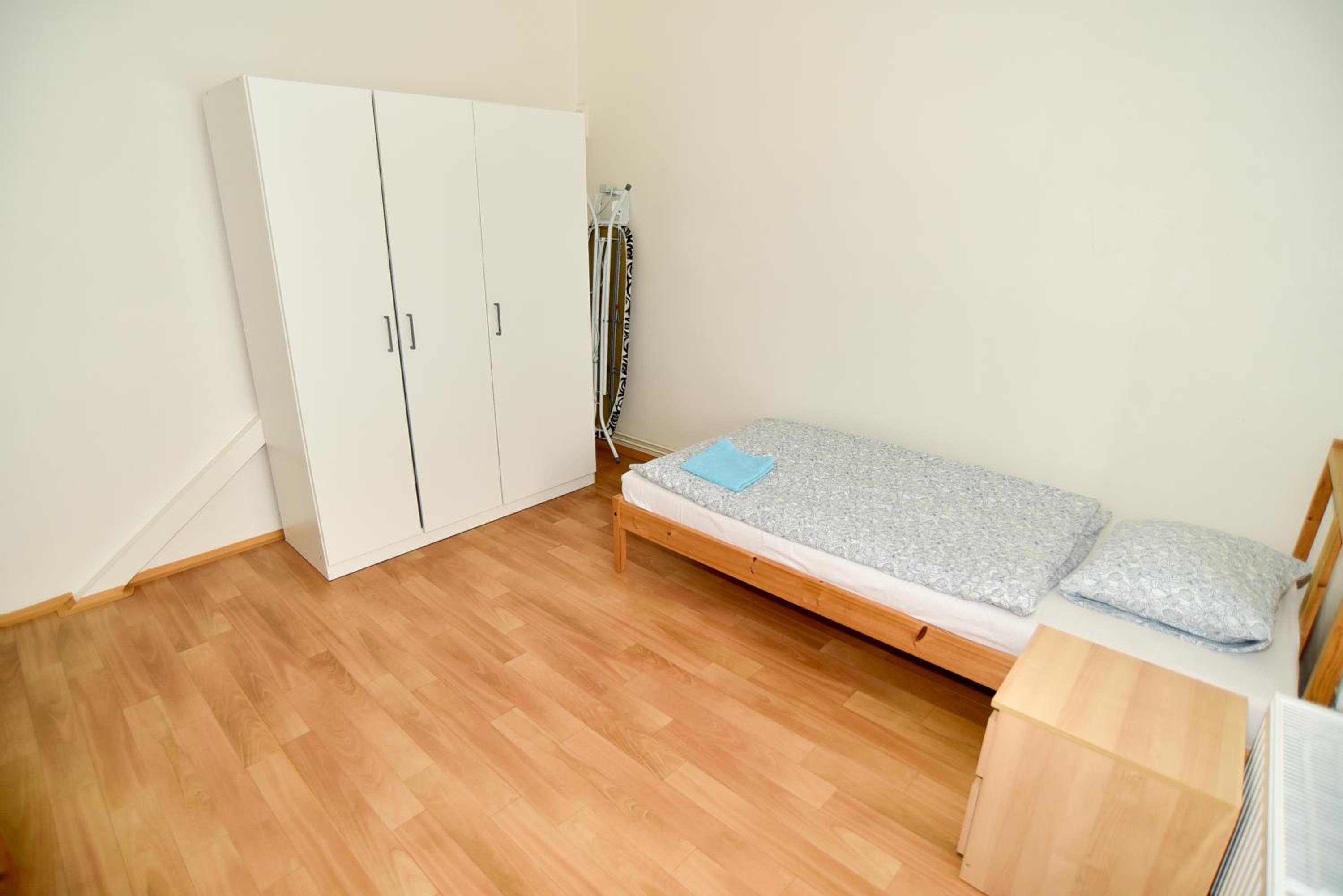 Three-Bedroom Apartment - Photo 50