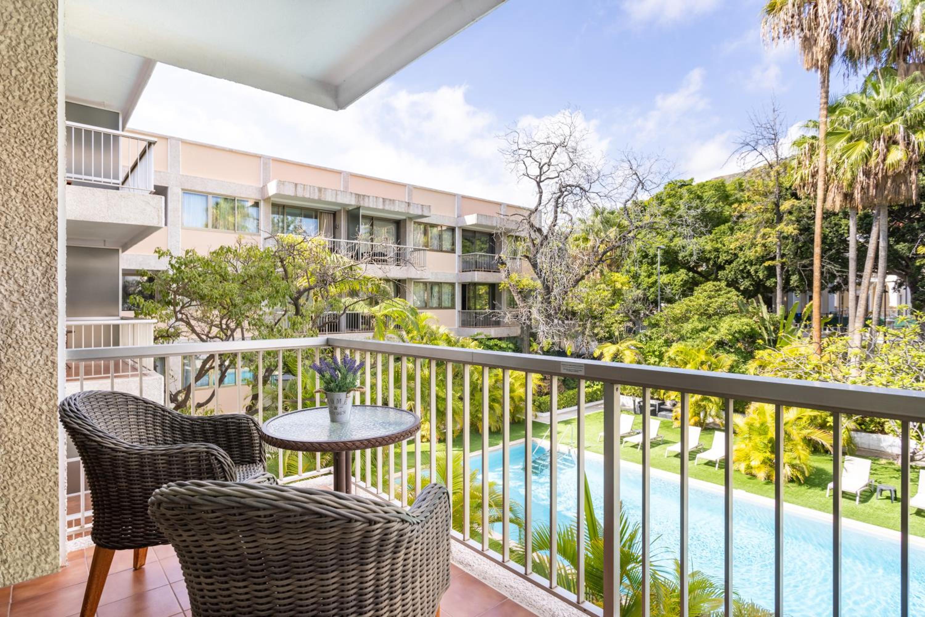 Double Room with Balcony and Pool View thumbnail 6