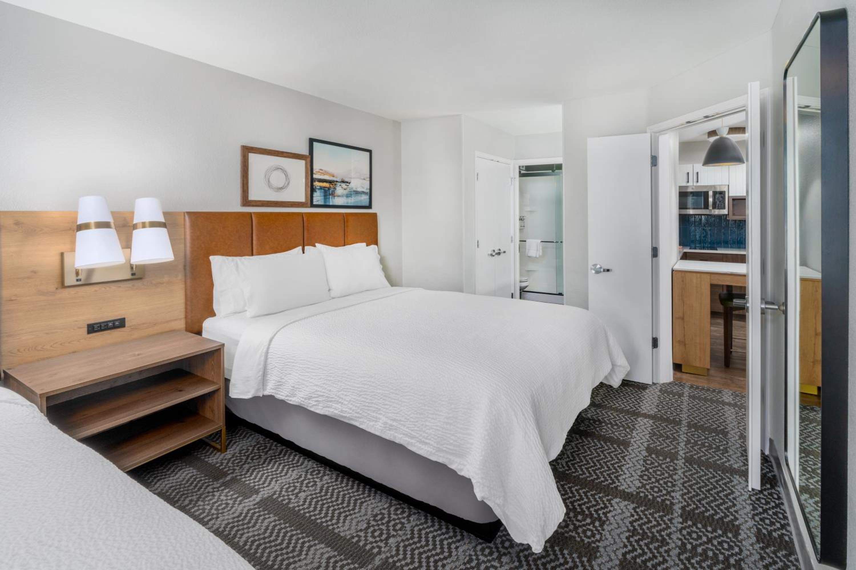 Queen Suite with Two Queen Beds and Sofa Bed - Photo 1