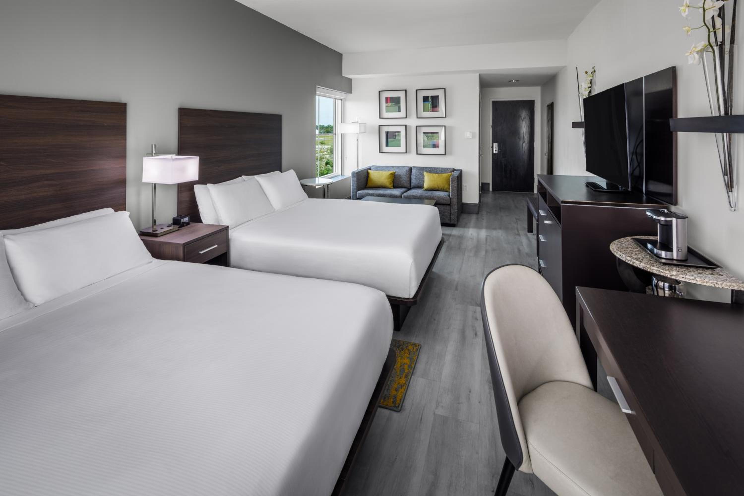 Queen Room with Two Queen Beds and Sofa Bed - Photo 2