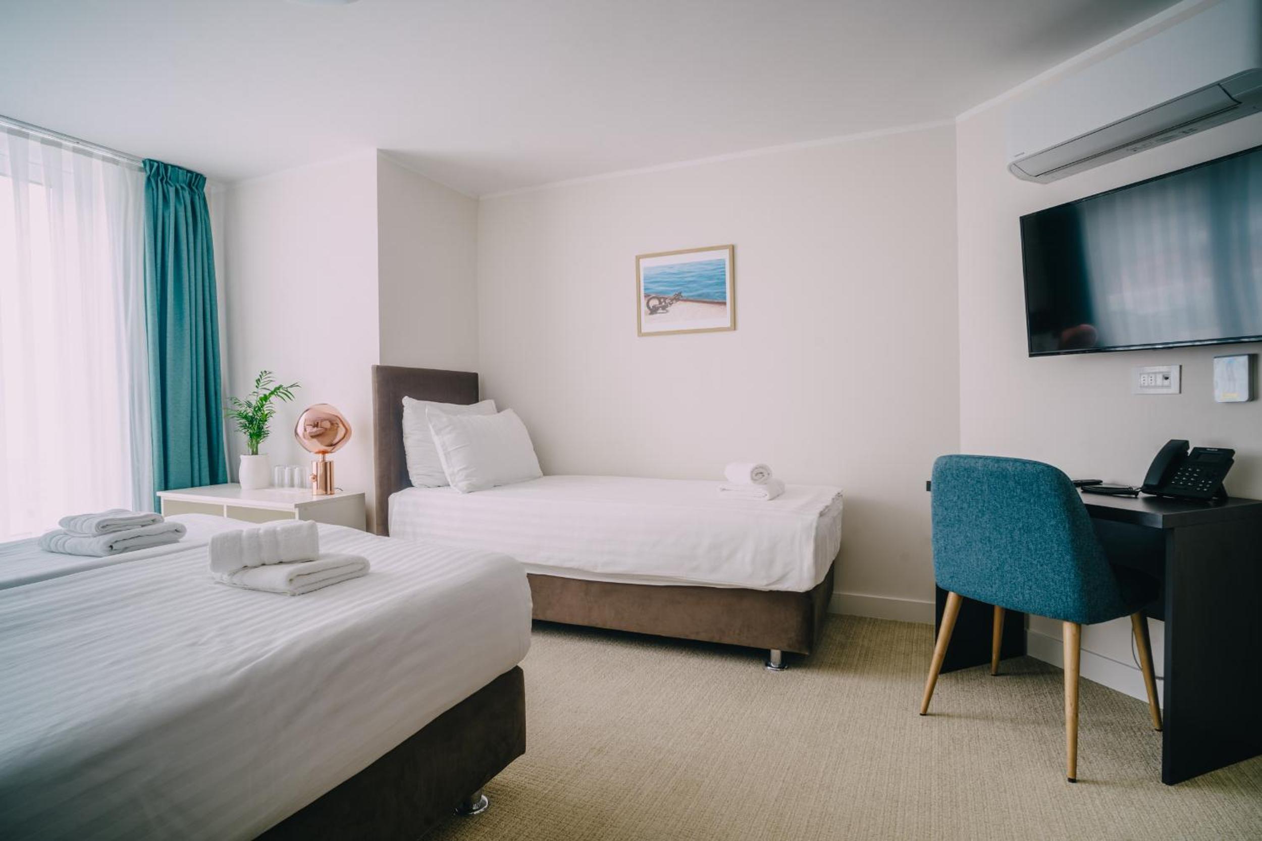 Quarto Triplo Padrão com Vista para o Mar