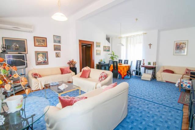 Four-Bedroom Apartment with Balcony and Sea View
