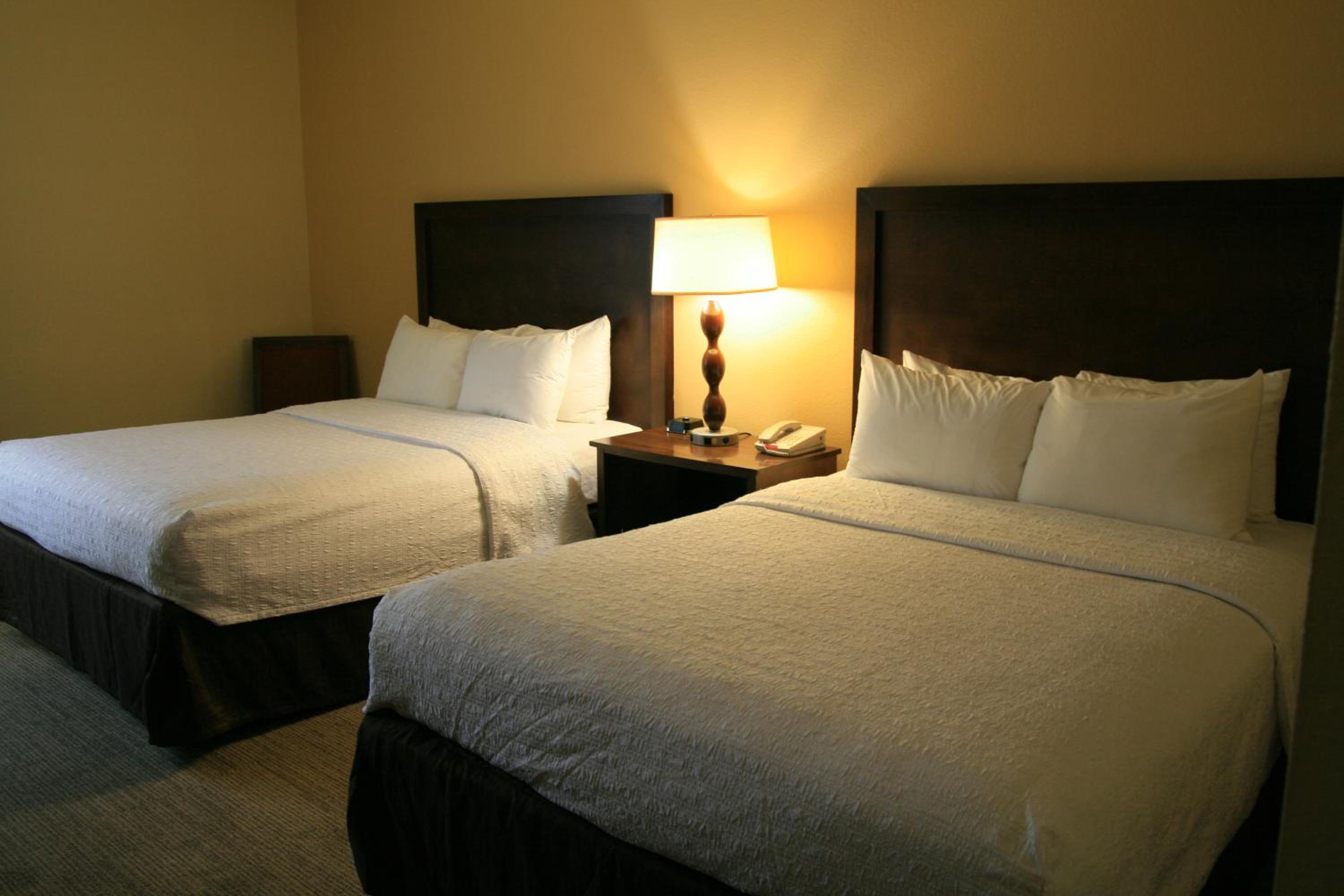 Quadruple Room with Two Queen Beds - Non Smoking - Photo 1