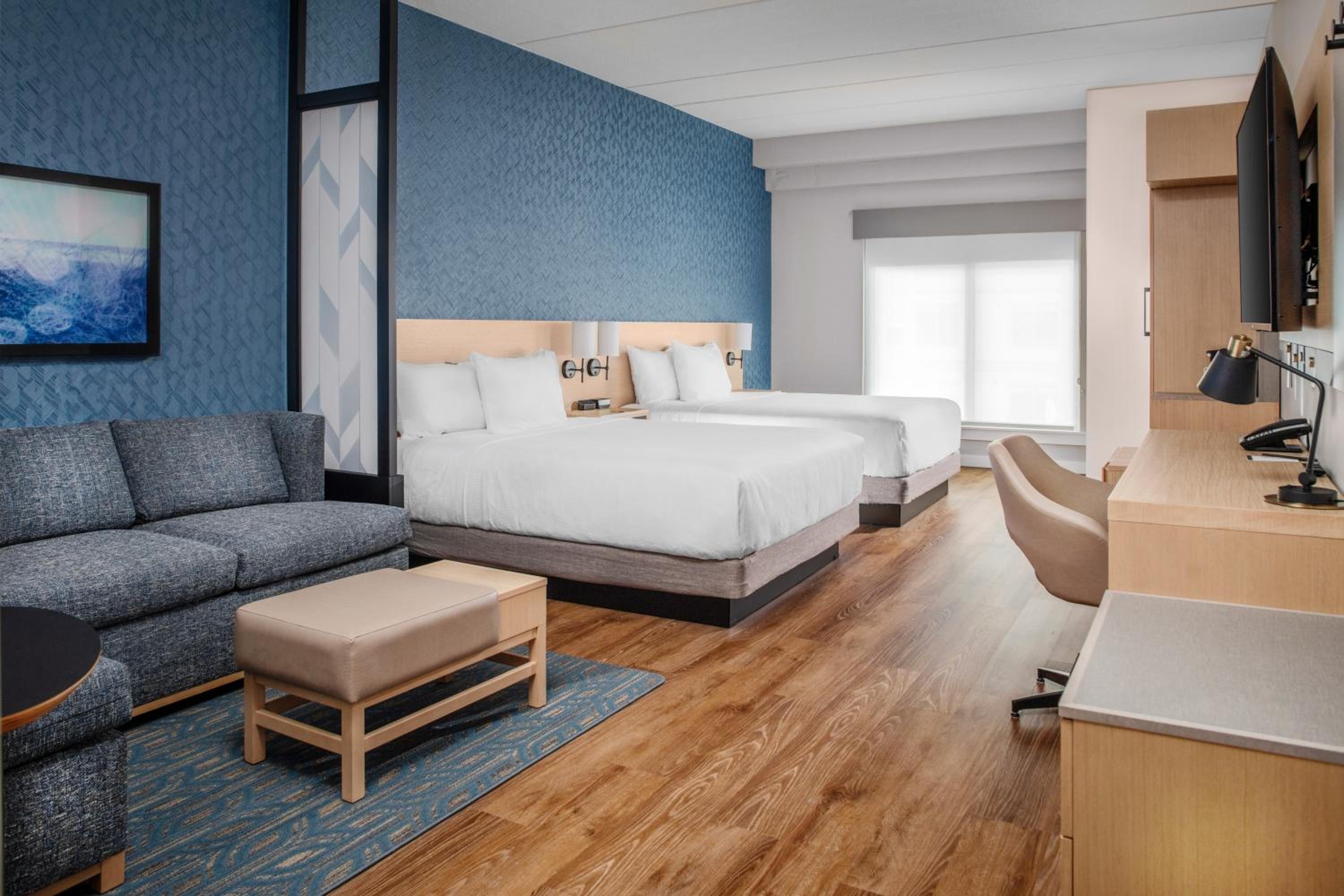Queen Room with Two Queen Beds and Sofa Bed - Photo 2