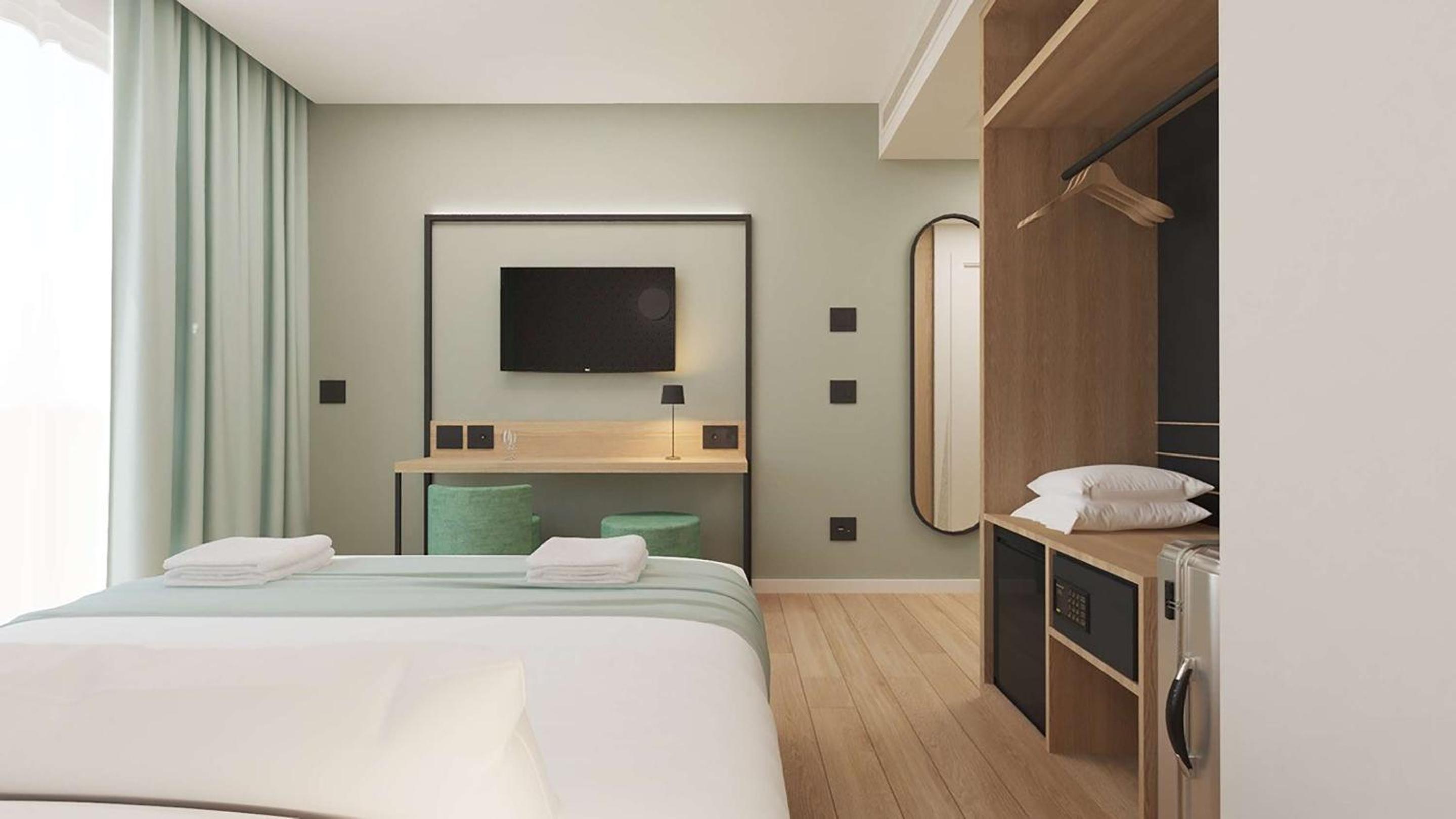 Two-Bedroom Superior Room with One King Bed and One Single Bed - Non-Smoking - Photo 1