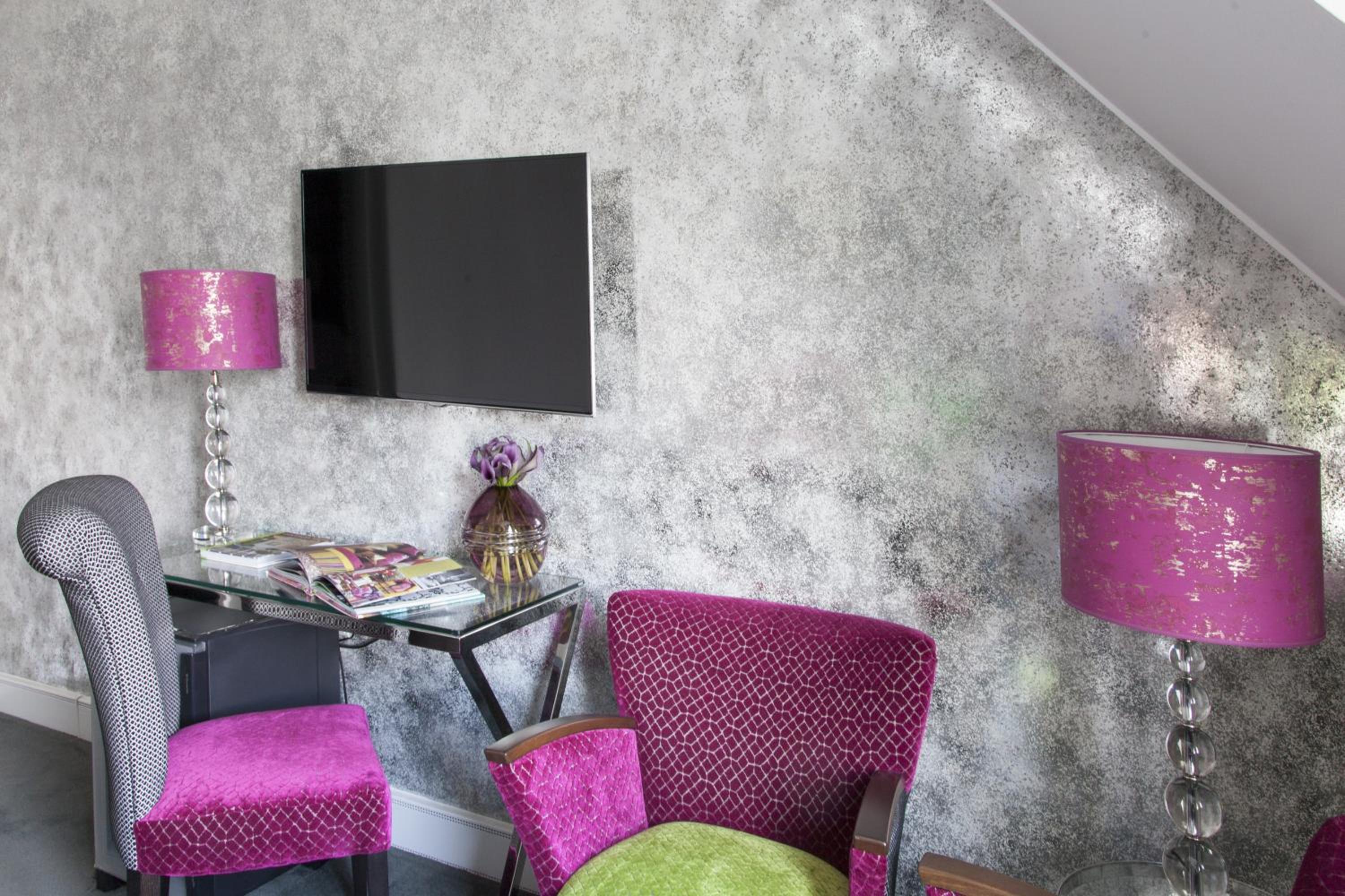 Stylish comfort awaits in your chic hotel room.