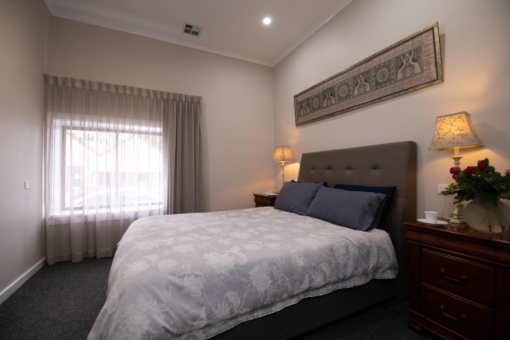 Deluxe Queen Room - Photo 16