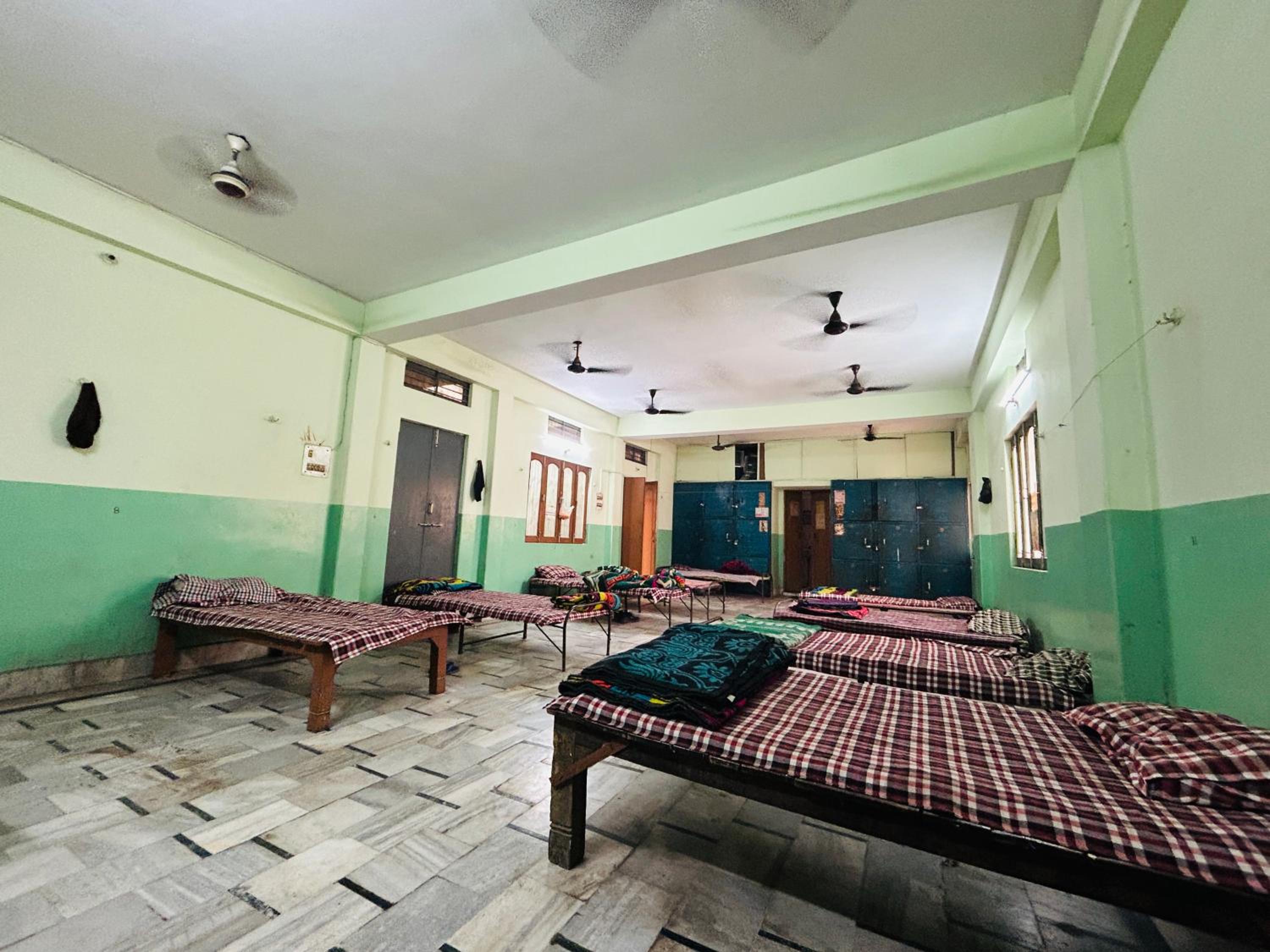 Single Bed In Male Dormitory Room