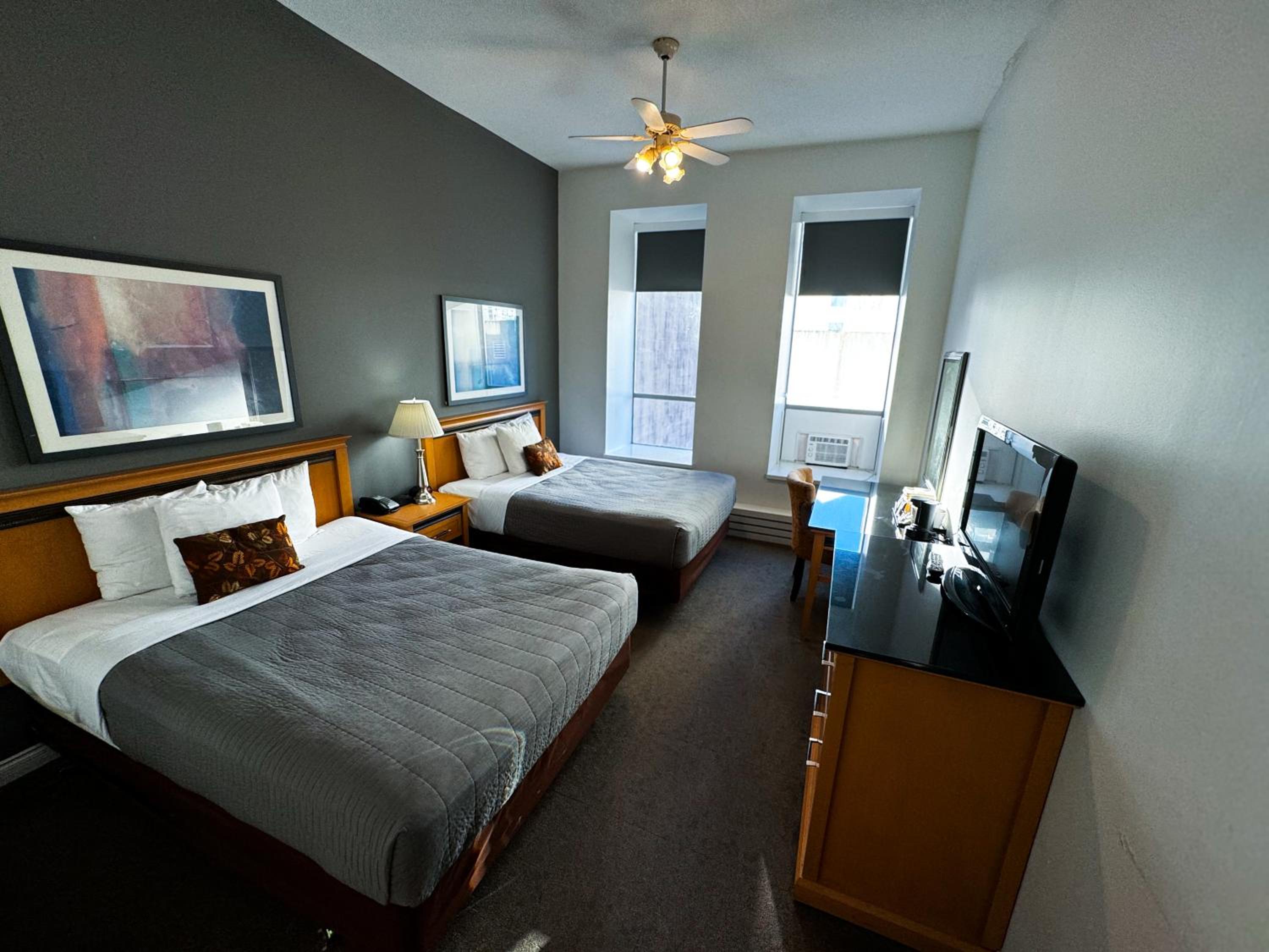 Queen Room with Two Queen Beds - Photo 1