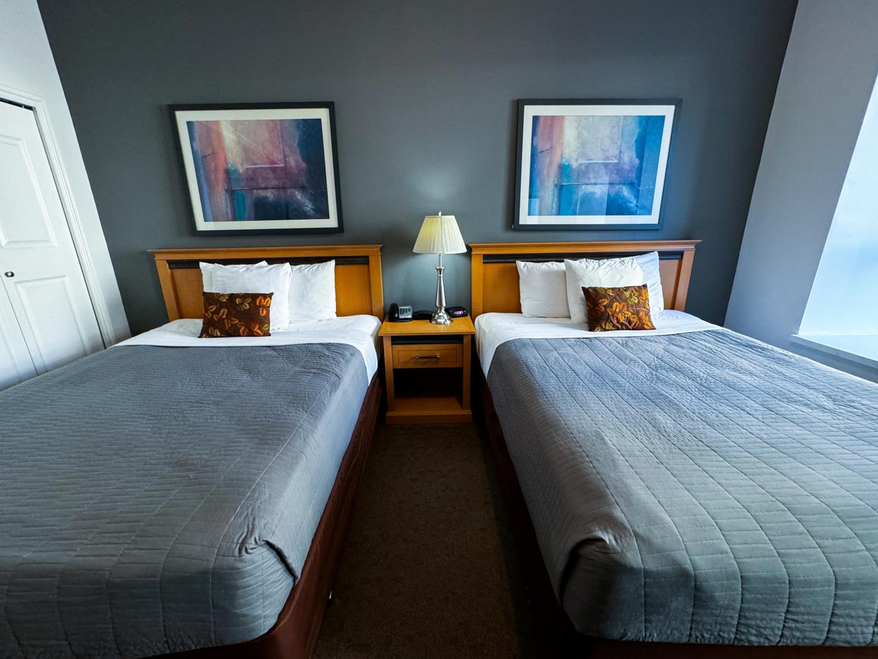 Queen Room with Two Queen Beds - Photo 6