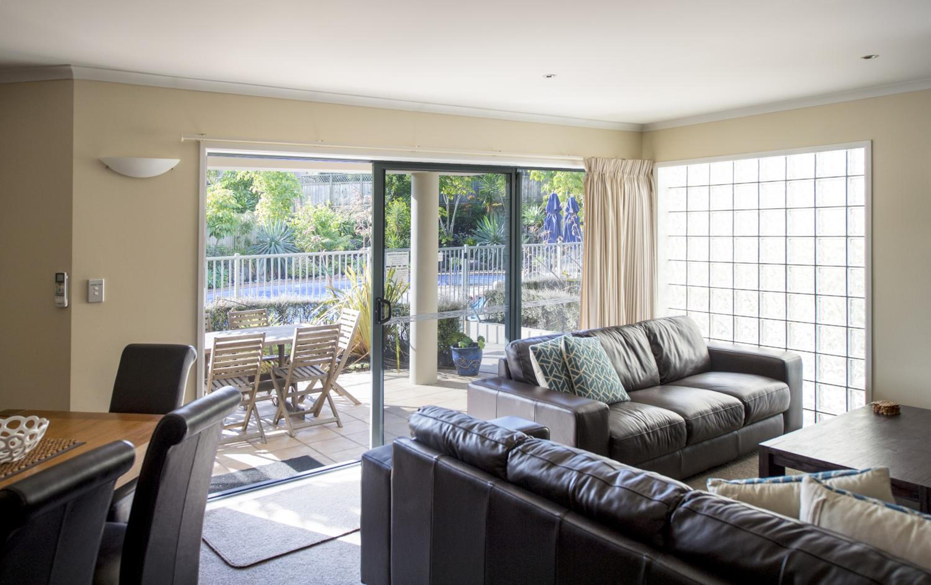Three-Bedroom Apartment with Pool - Side photo 1