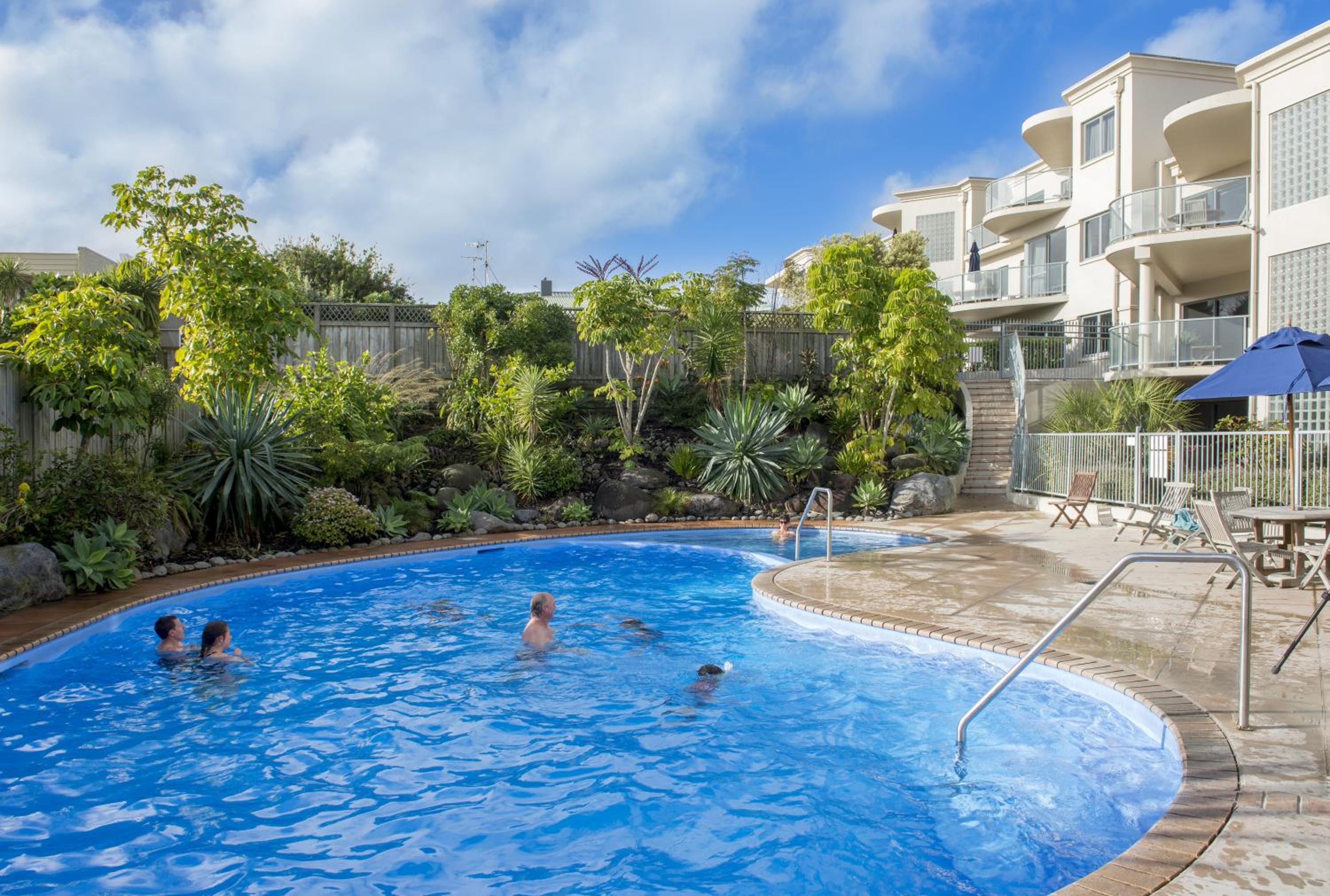 Three-Bedroom Apartment with Pool - Side photo 3