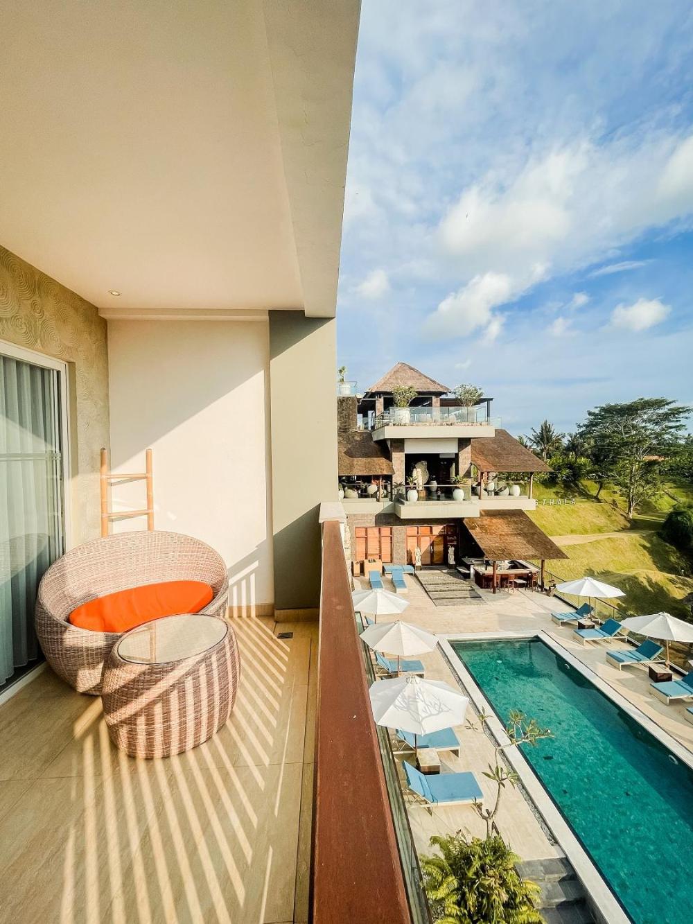 Deluxe Twin Balcony Room with River View, with FREE daily shuttle to Ubud City, FREE Photo Session, FREE Art Gallery Visit, 24-hour access to Fitness Center, FREE Welcome Drink, and FREE Kids Activities. photo 2