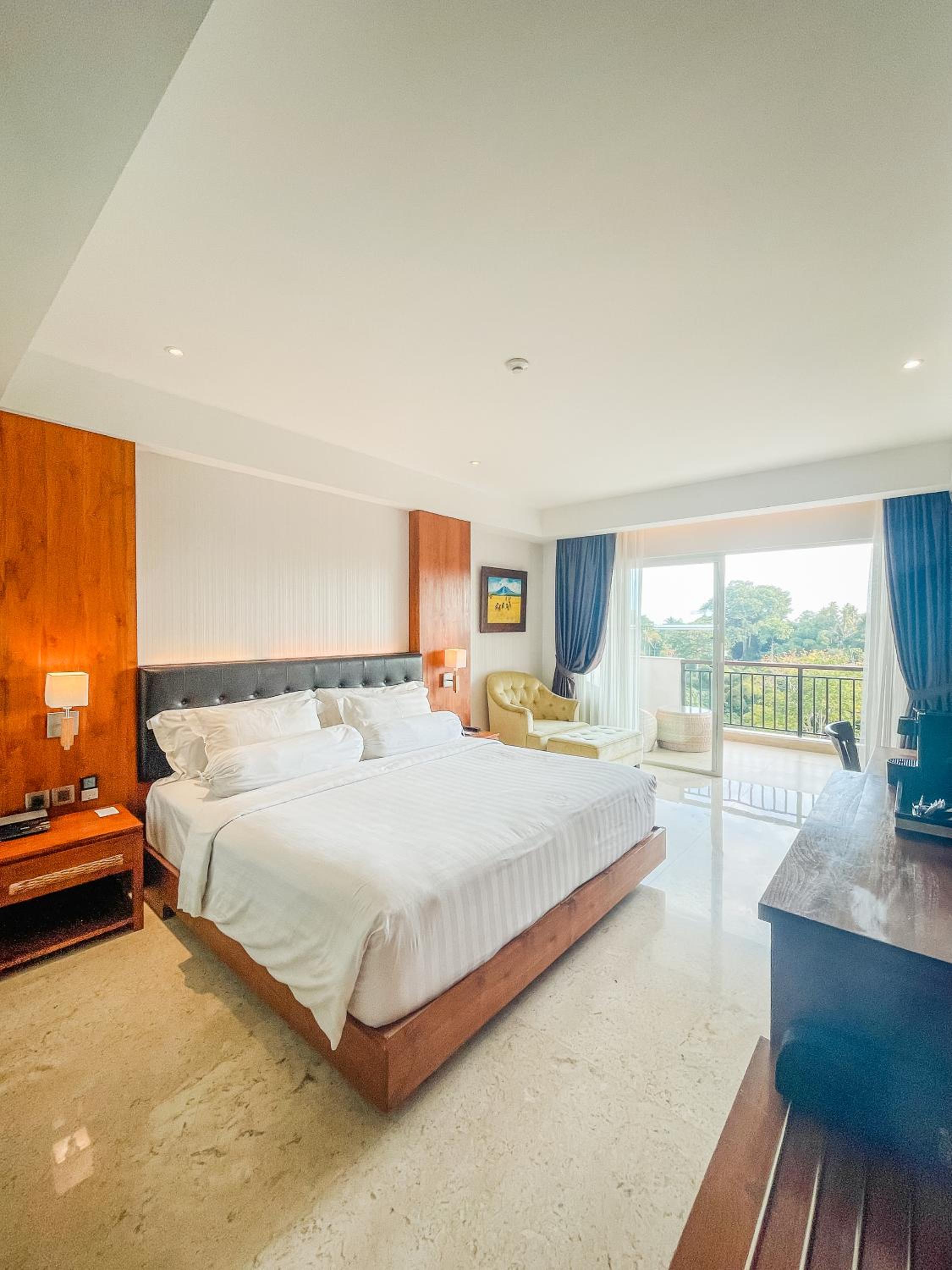 Deluxe Twin Balcony Room with River View, with FREE daily shuttle to Ubud City, FREE Photo Session, FREE Art Gallery Visit, 24-hour access to Fitness Center, FREE Welcome Drink, and FREE Kids Activities.