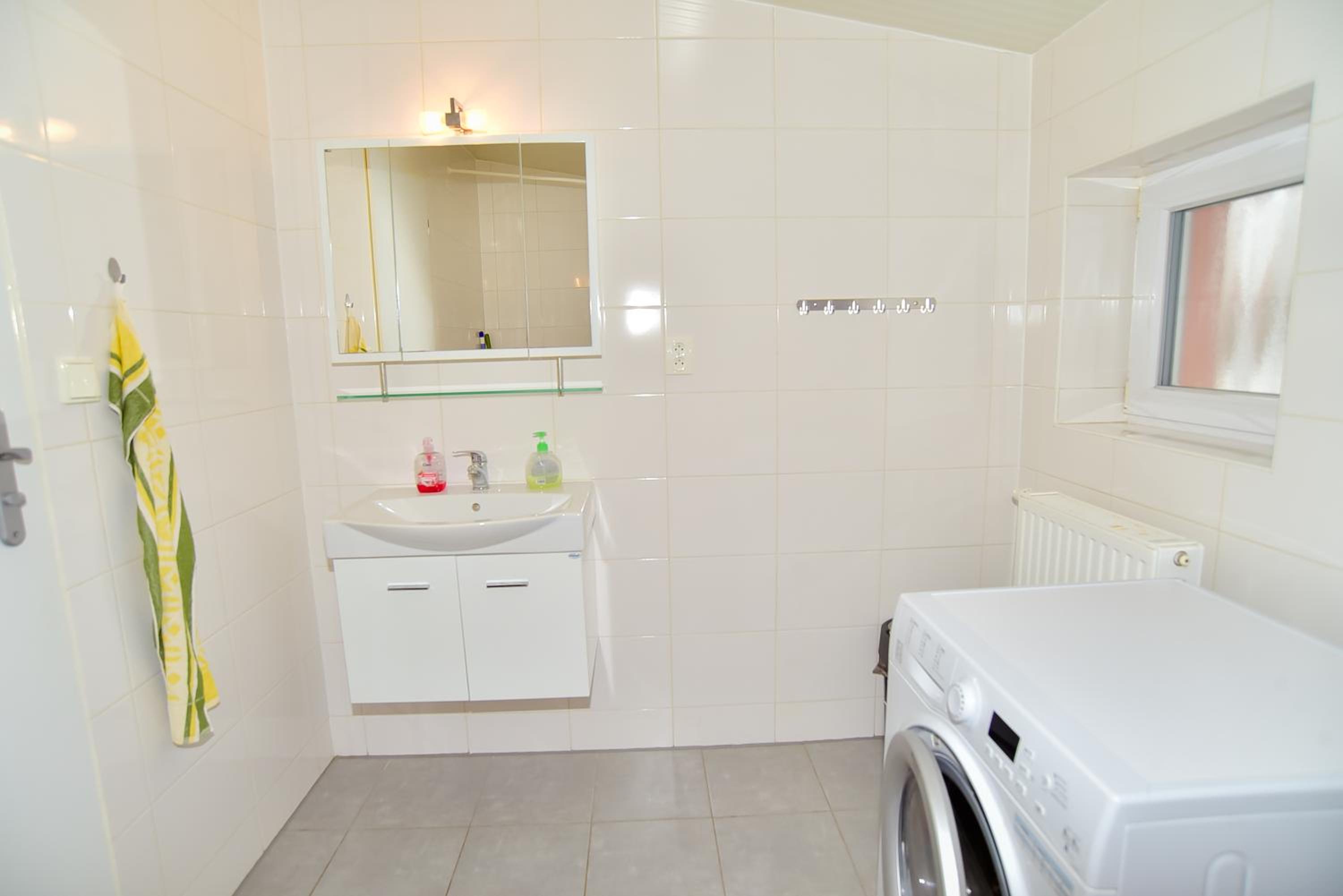 Three-Bedroom Apartment - Photo 53