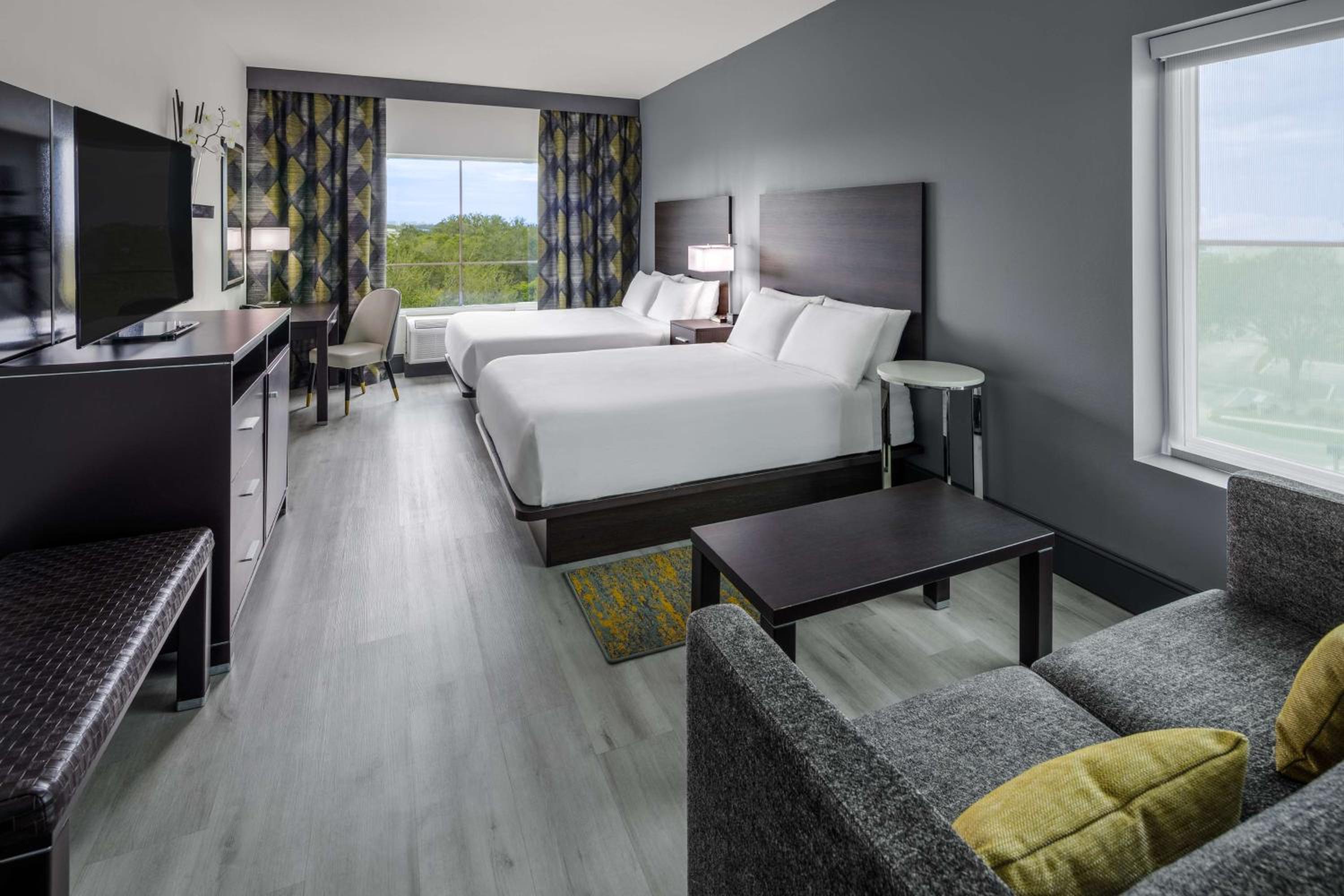 Queen Room with Two Queen Beds and Sofa Bed - Photo 1