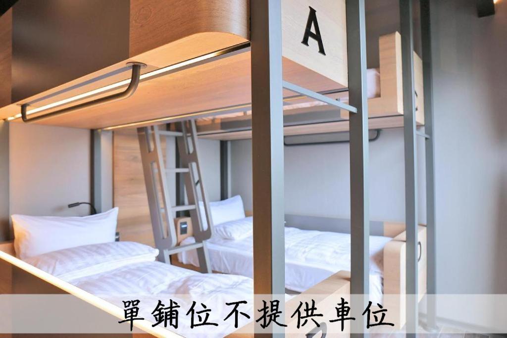 Upper Bunk Bed in Male Dormitory Room photo 1
