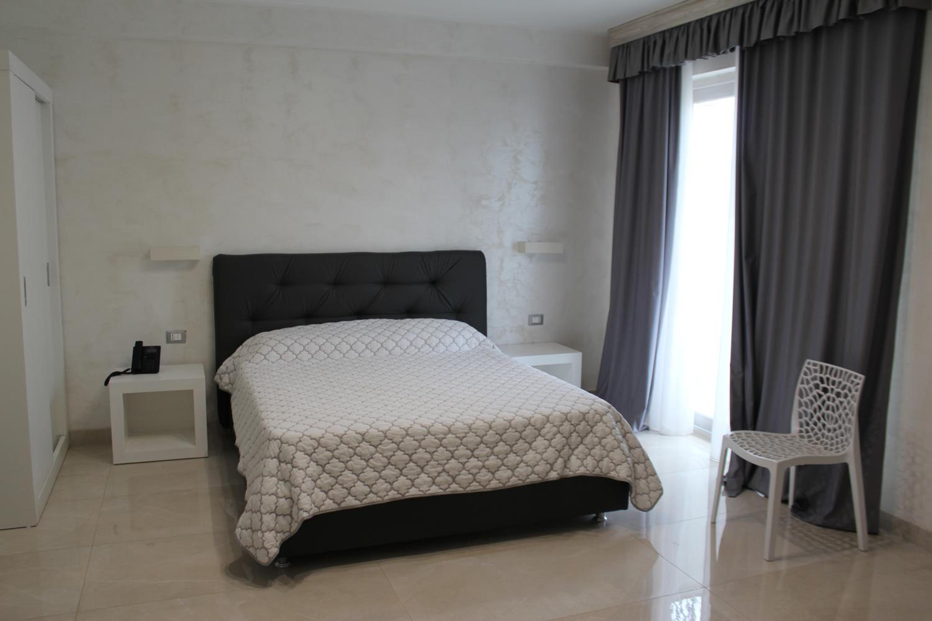 Quadruple Room with Balcony