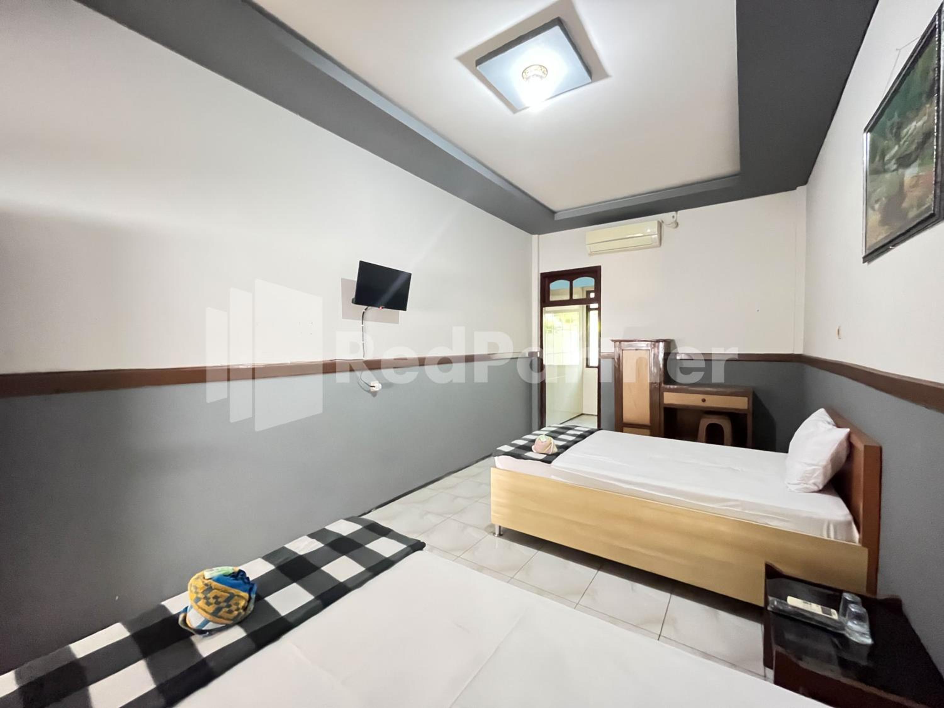 Twin Room - Photo 13