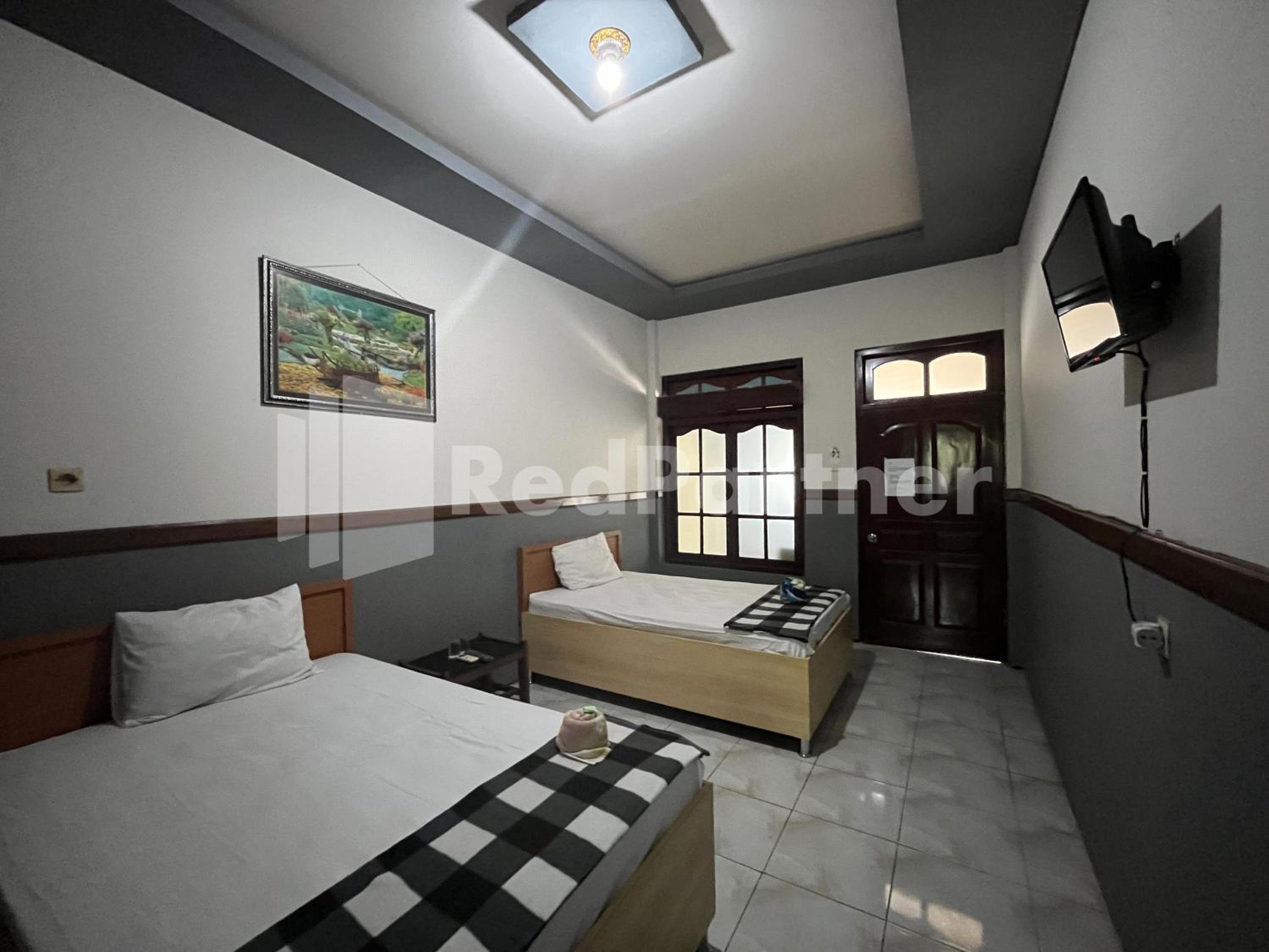 Twin Room - Photo 10