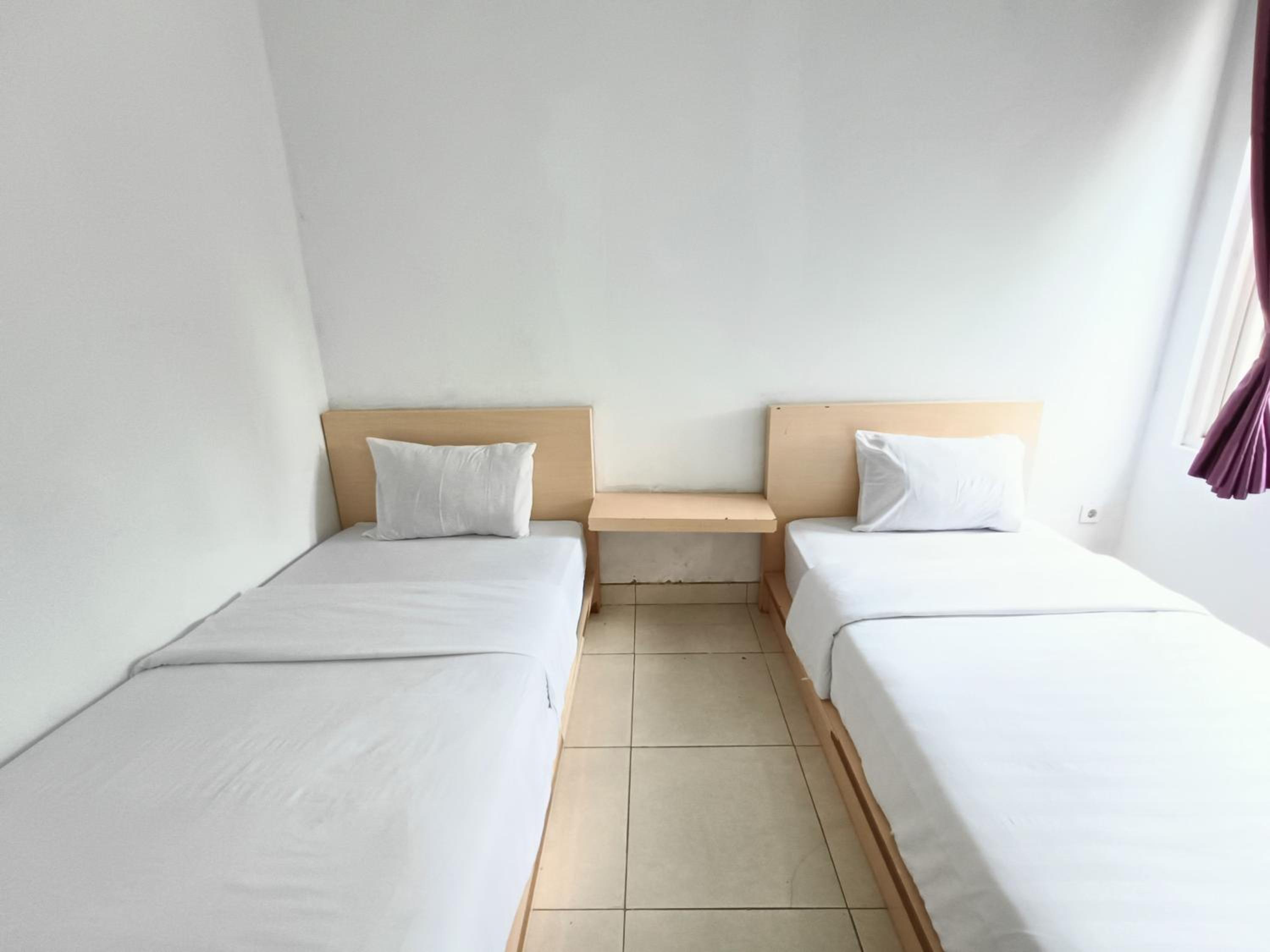 Twin Room - Photo 1