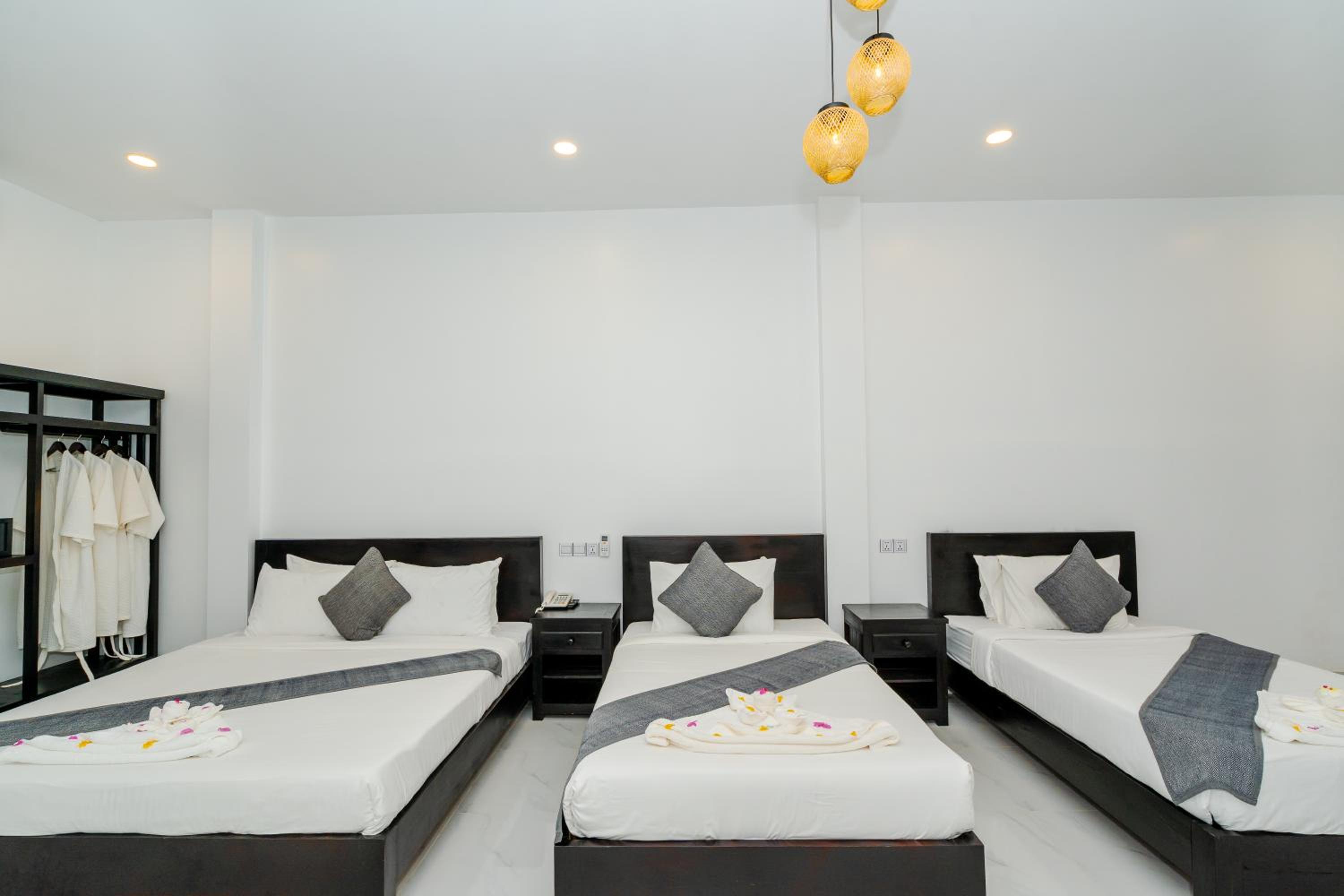 Deluxe Triple Room - Photo 5
