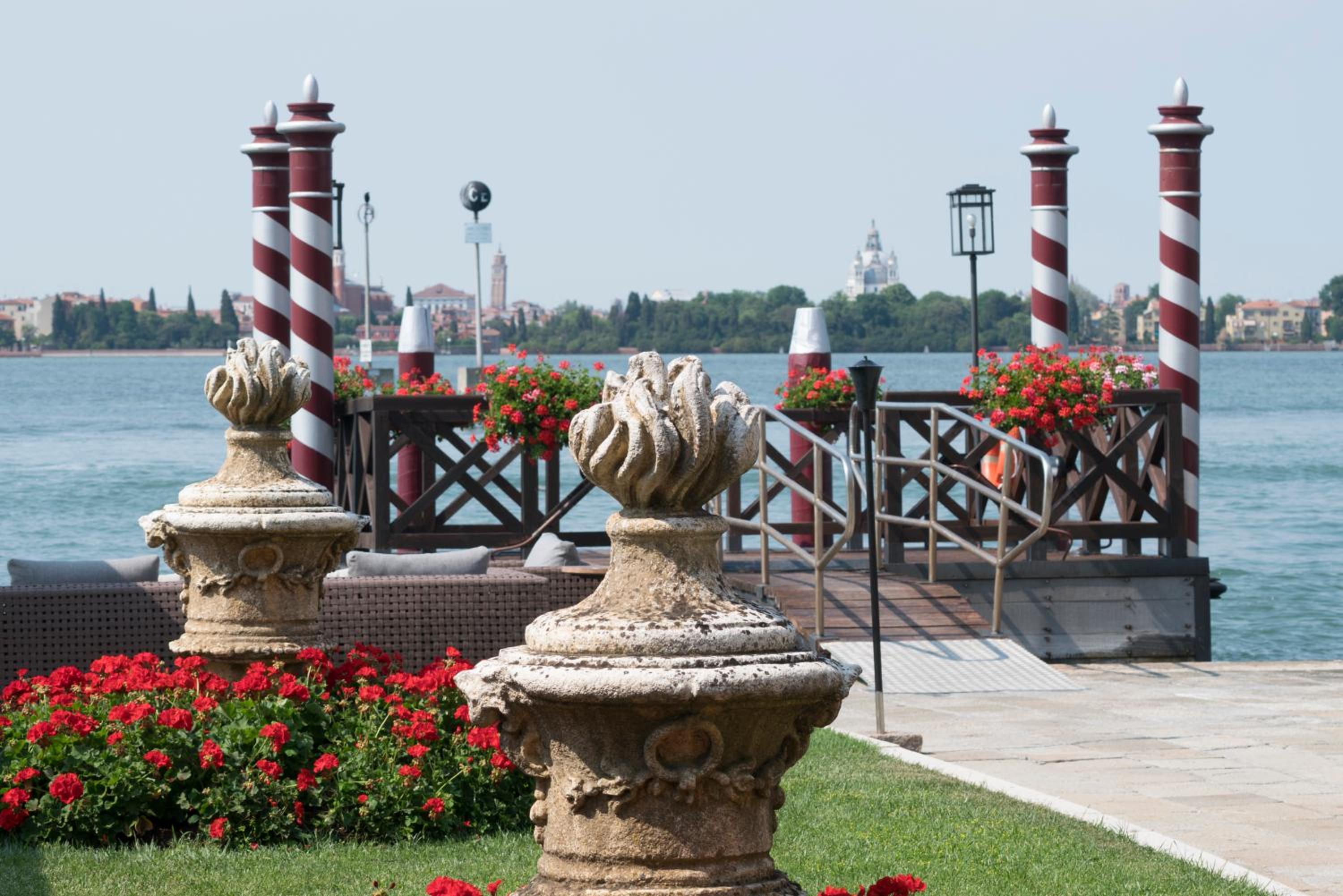 gondola with red flowers in the foreground