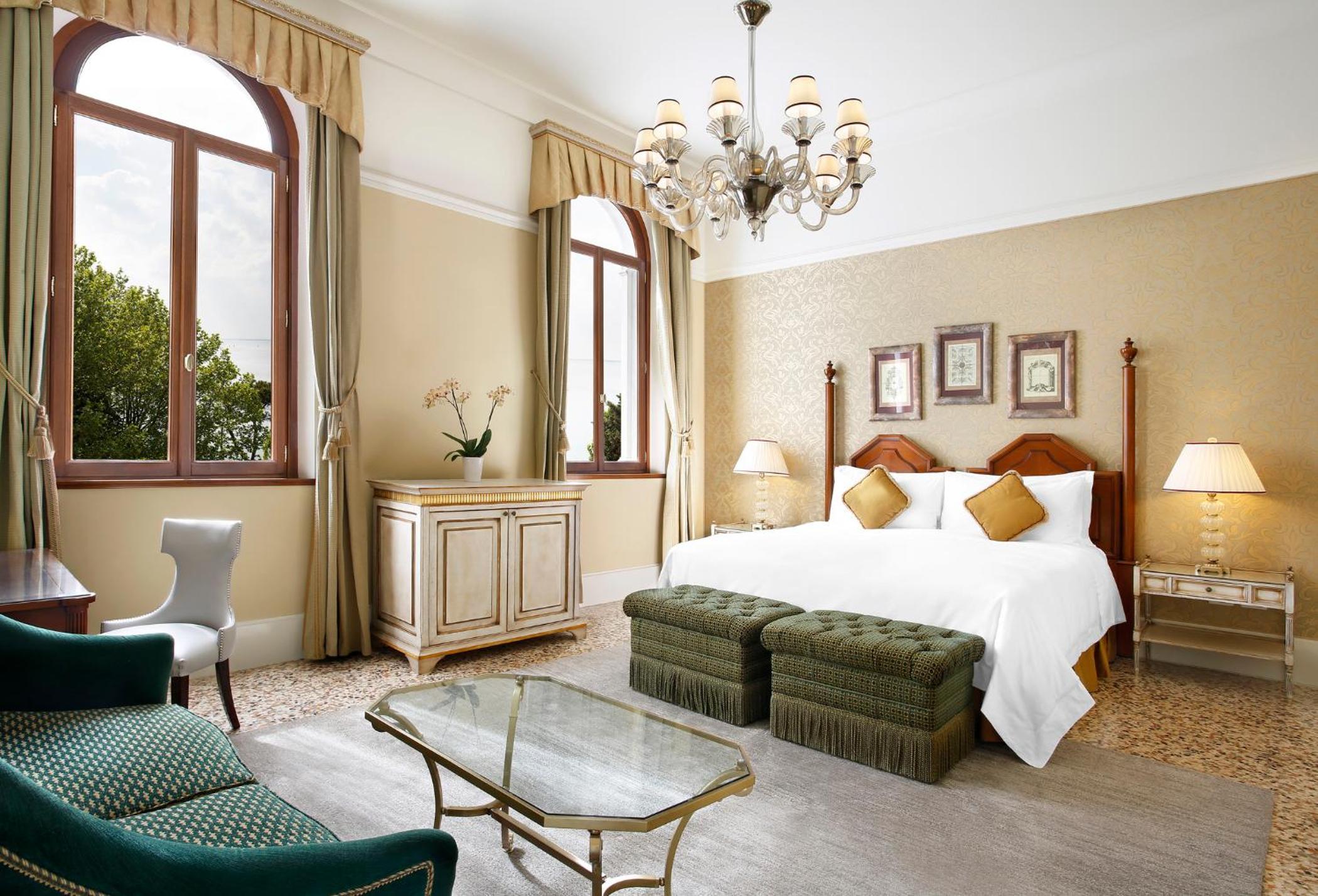 hotel room with a king size bed and sitting area