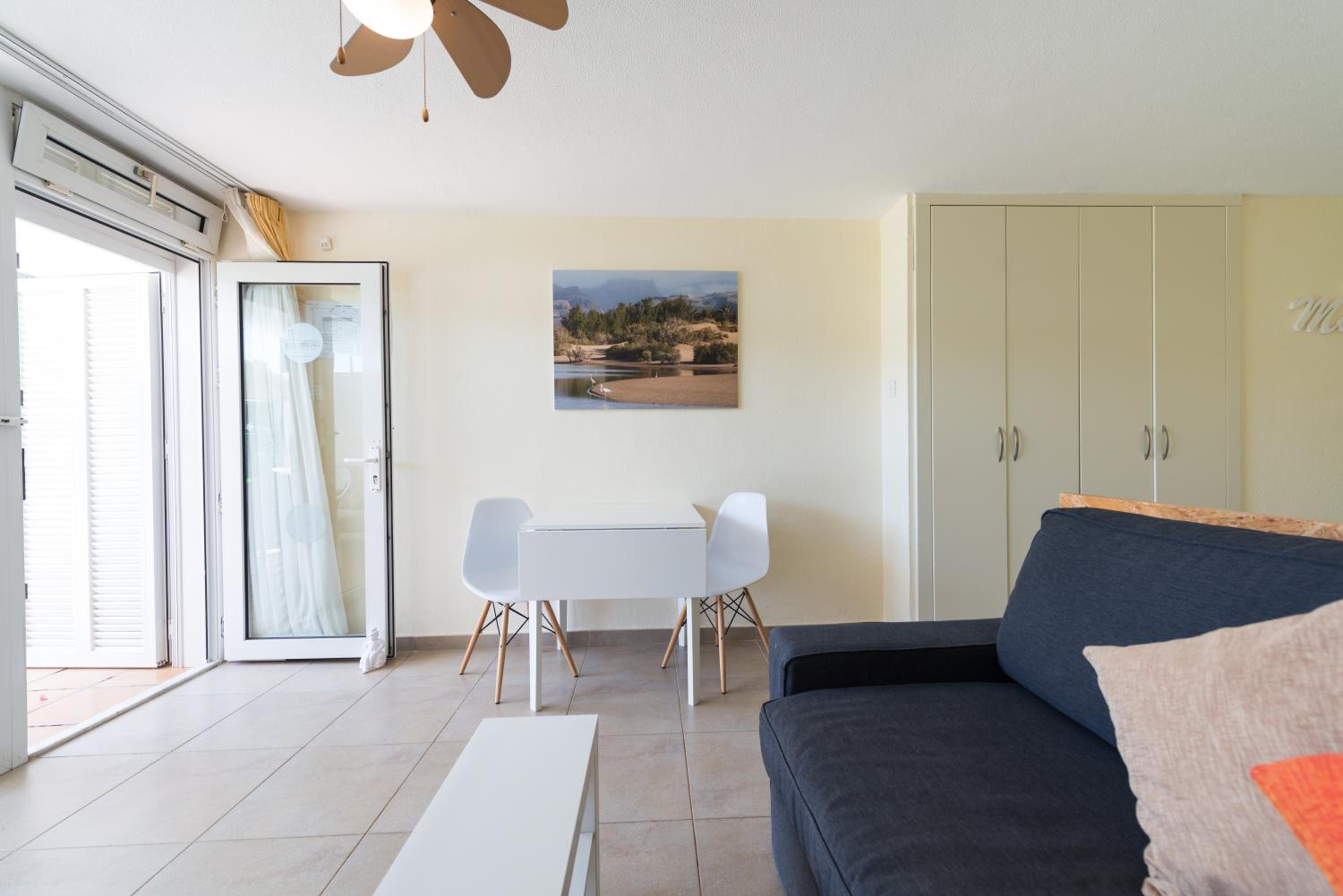 Apartamento de una habitación con vista al jardín