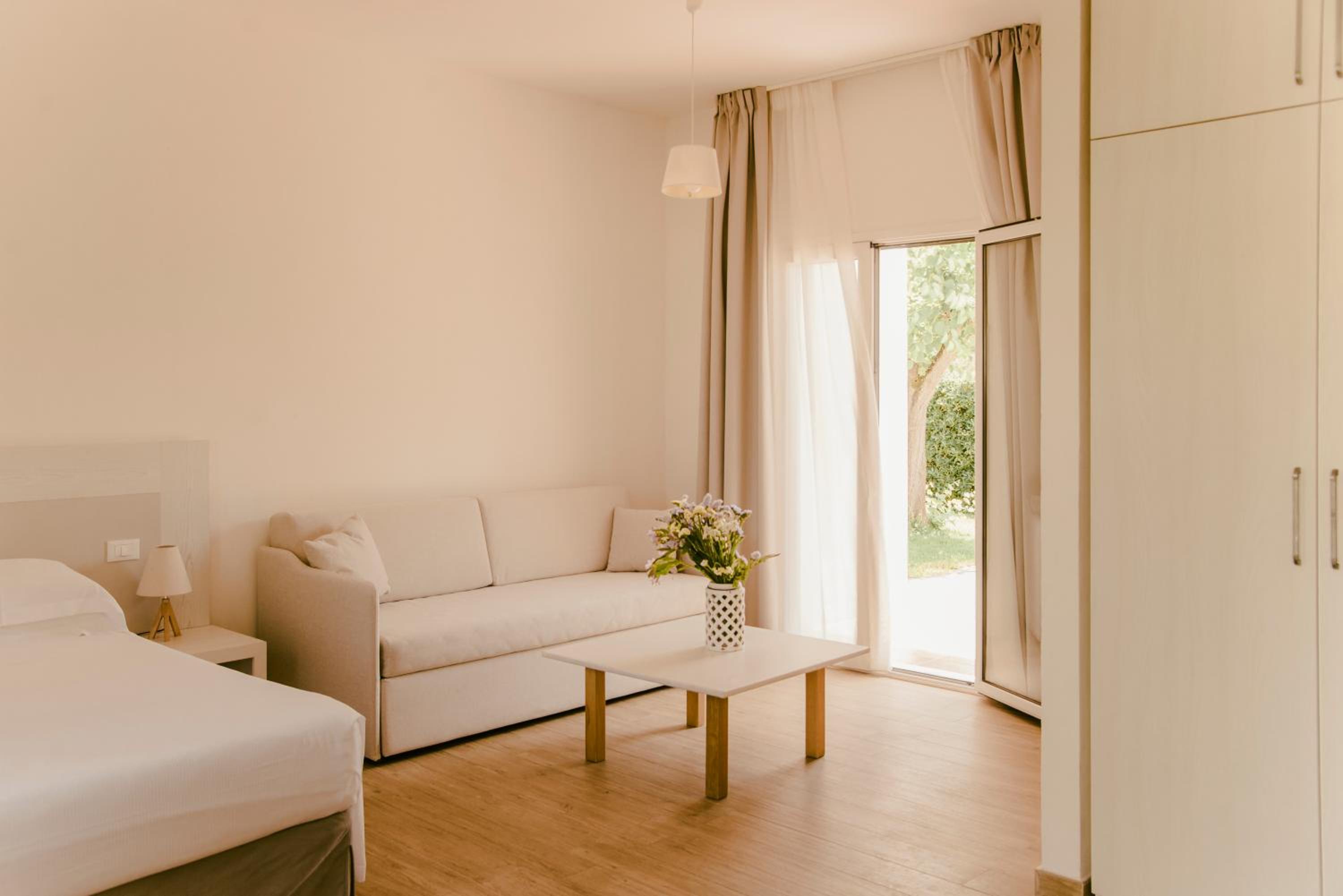 Quadruple Room with Patio - Photo 12