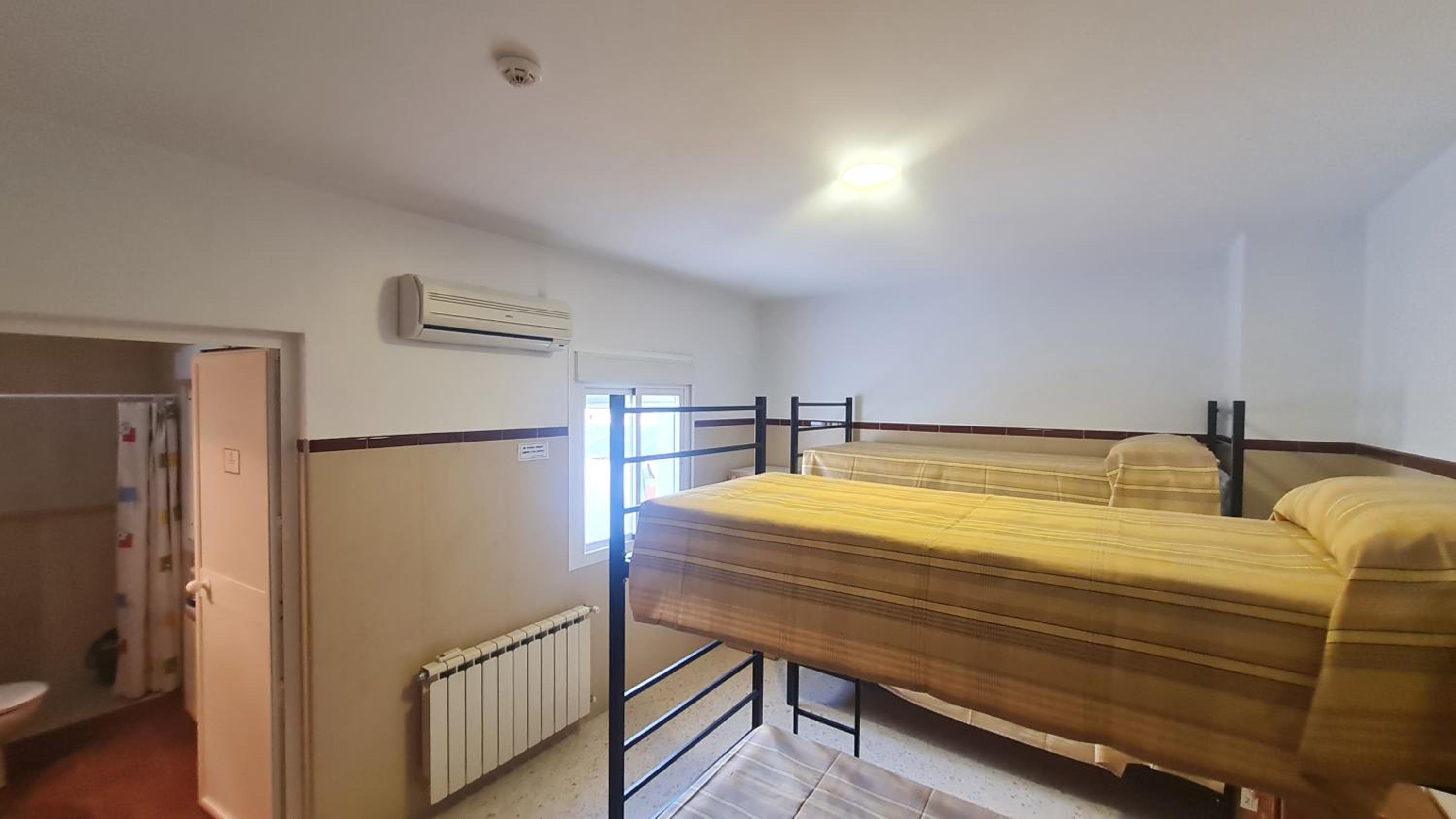 Habitación Cuádruple con Baño Privado