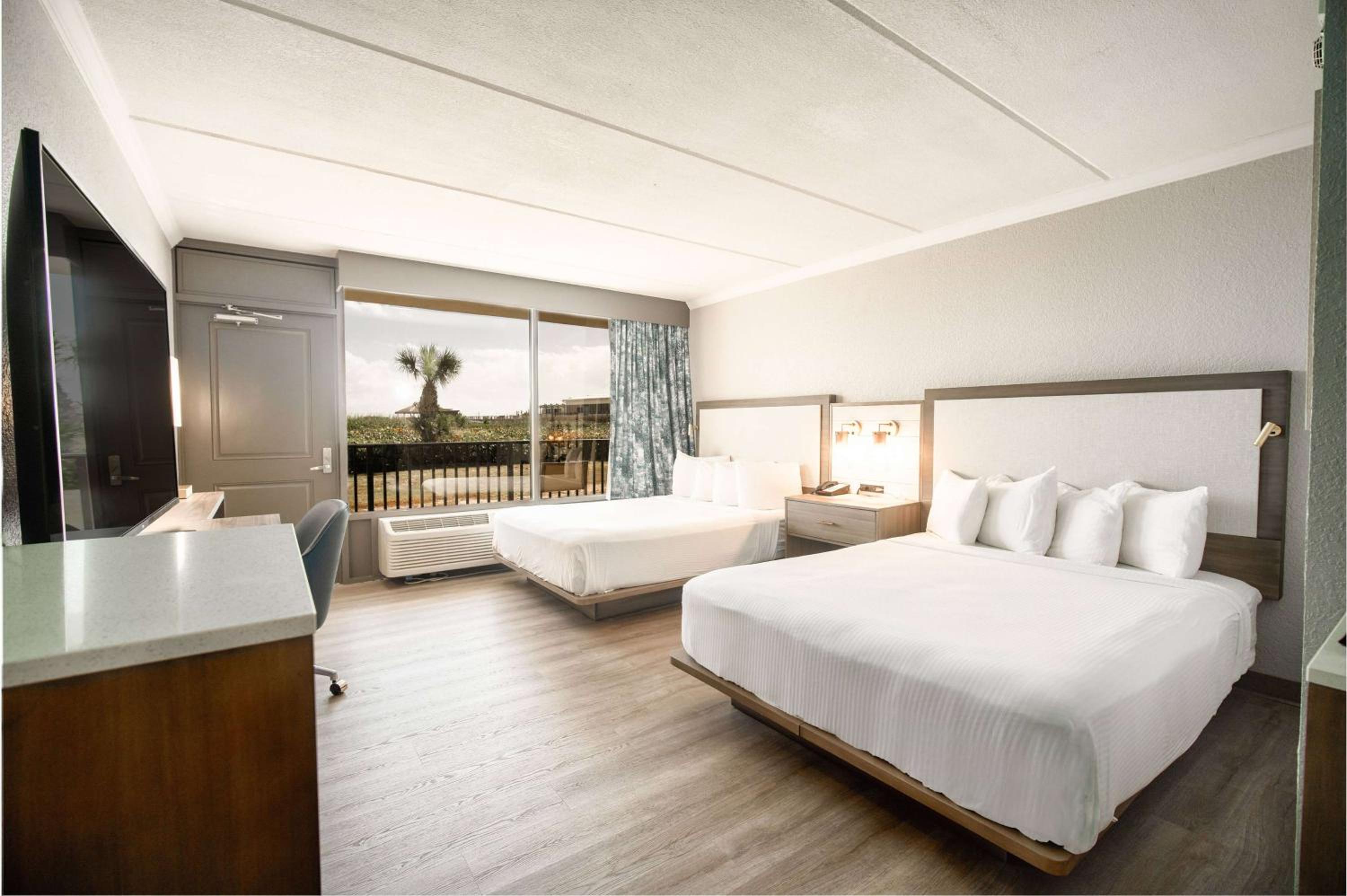 Queen Room with Two Queen Beds and Balcony - Non-Smoking at La Quinta by Wyndham Cocoa Beach Oceanfront in Cocoa Beach
