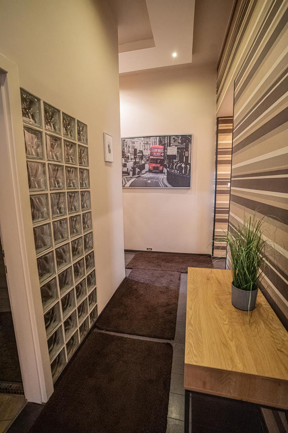 Three-Bedroom Apartment - Photo 12