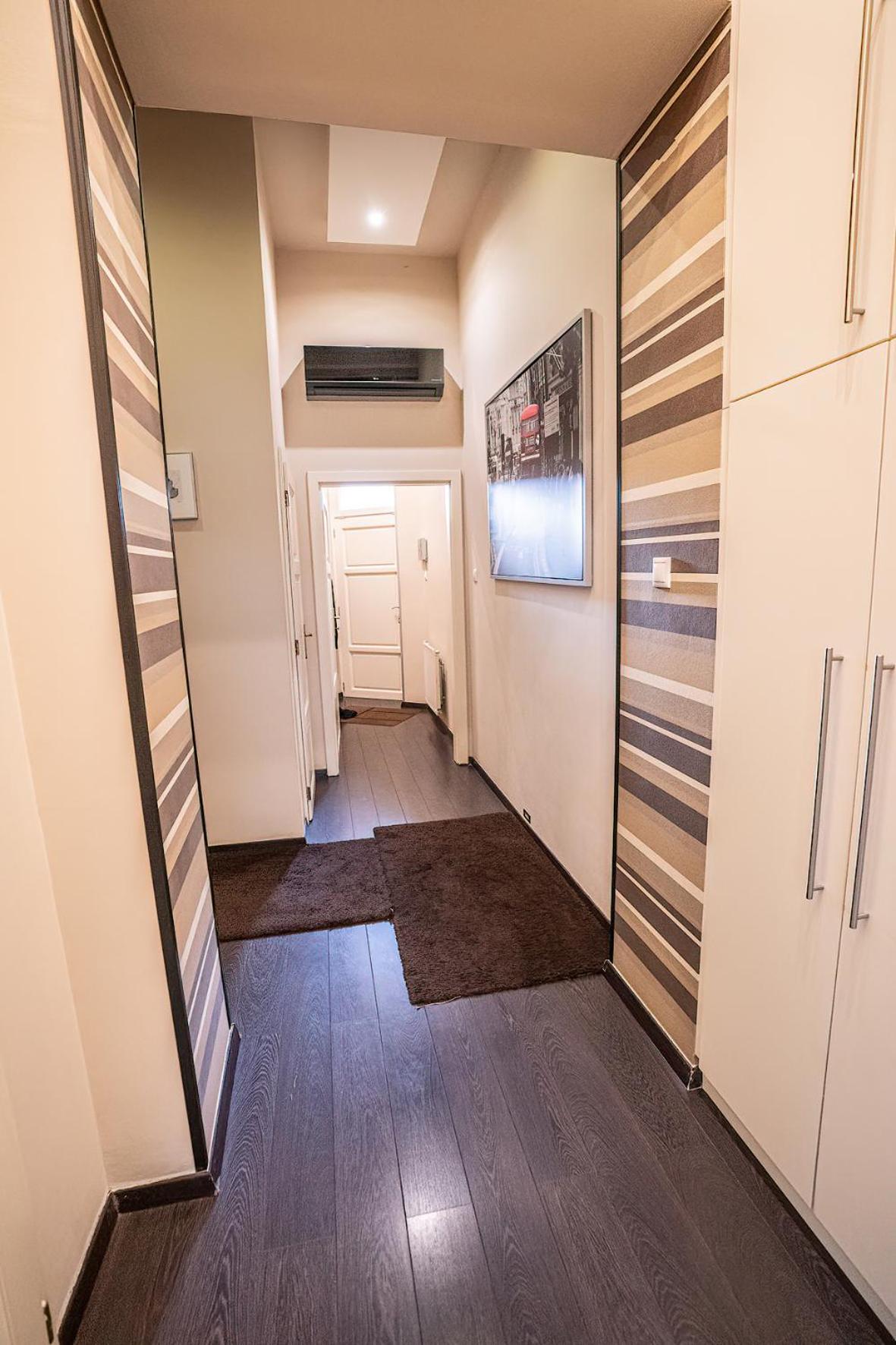 Three-Bedroom Apartment - Photo 26