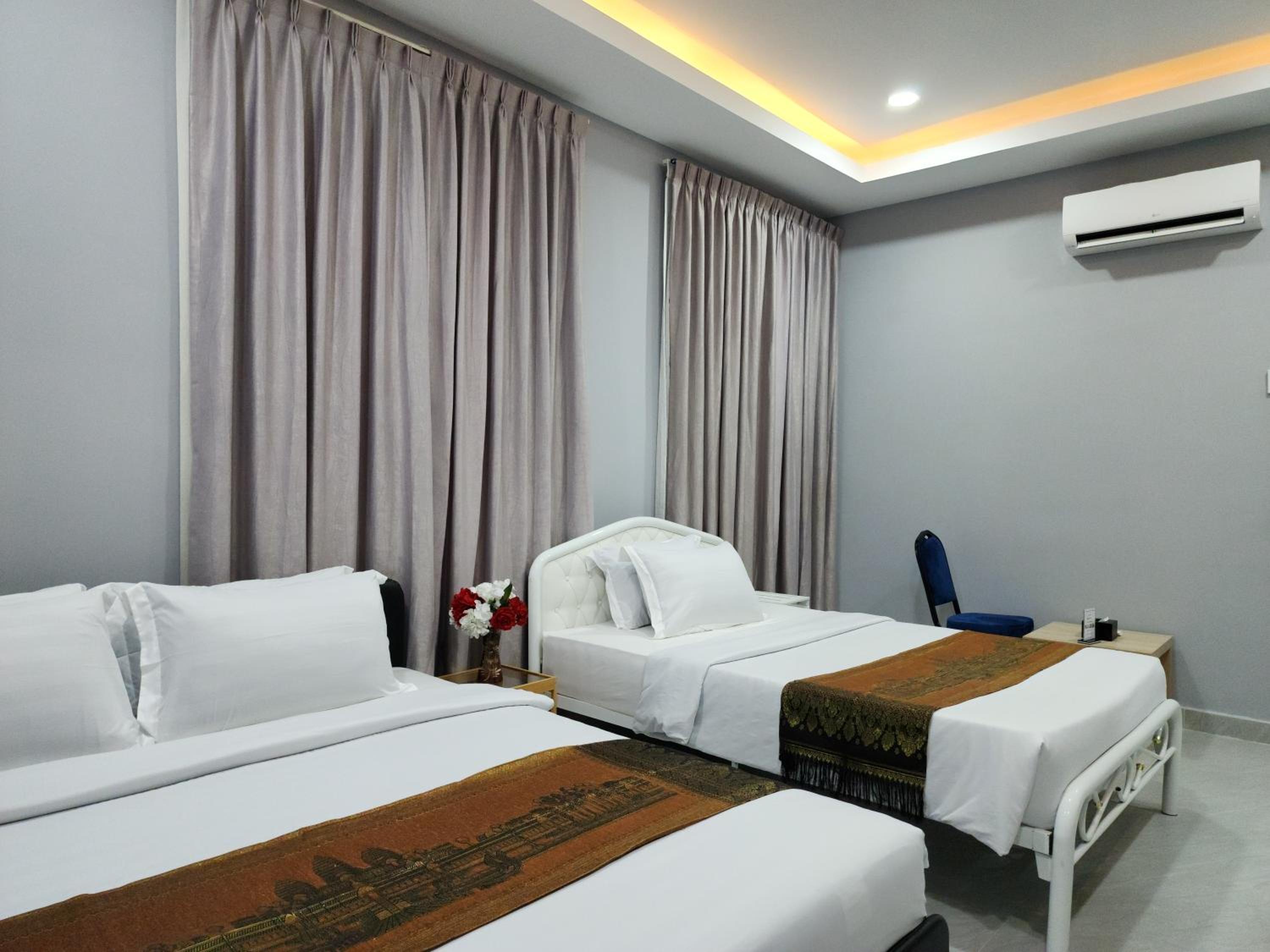 Deluxe Twin Room - Photo 10