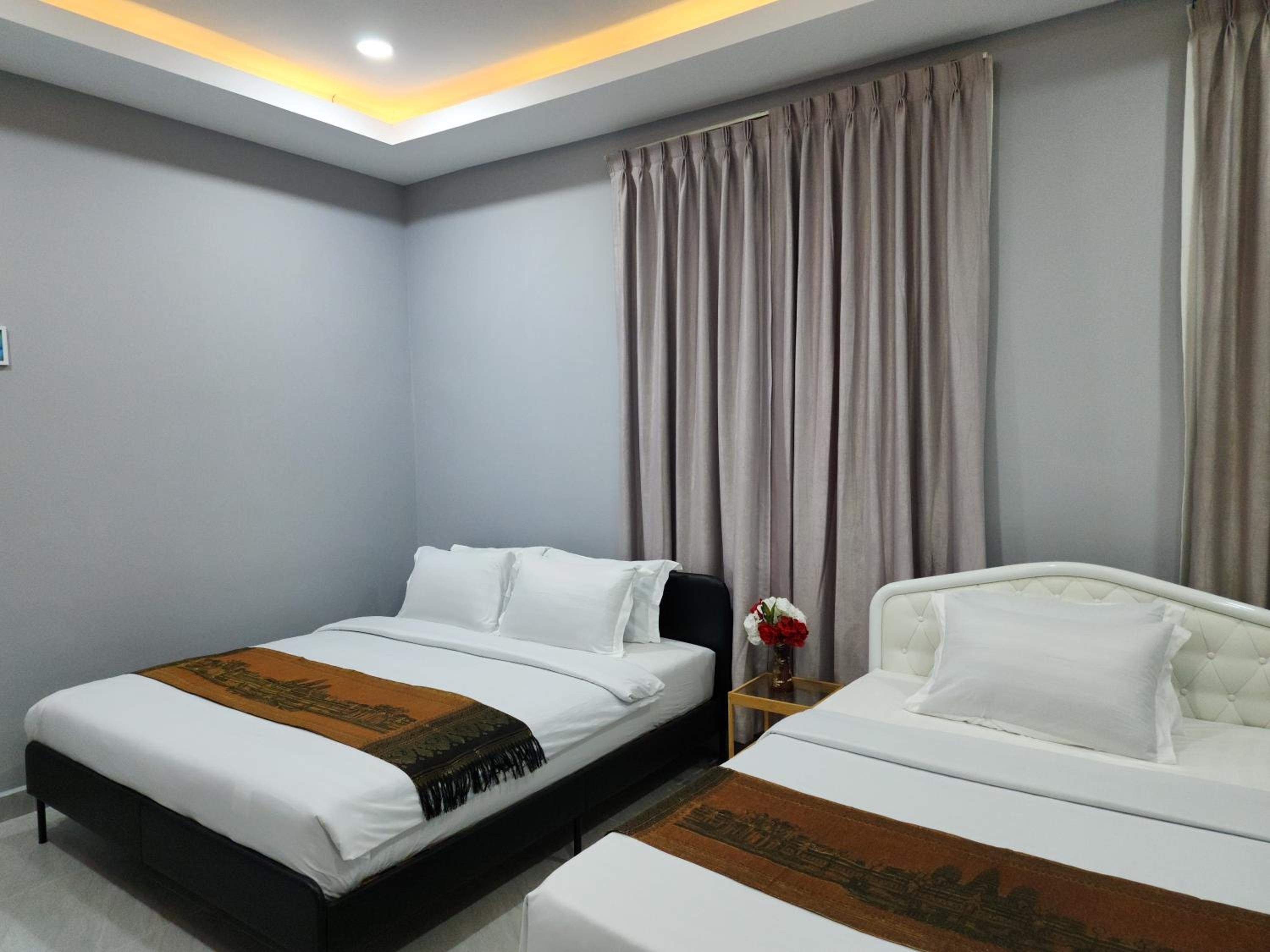 Deluxe Twin Room - Photo 12