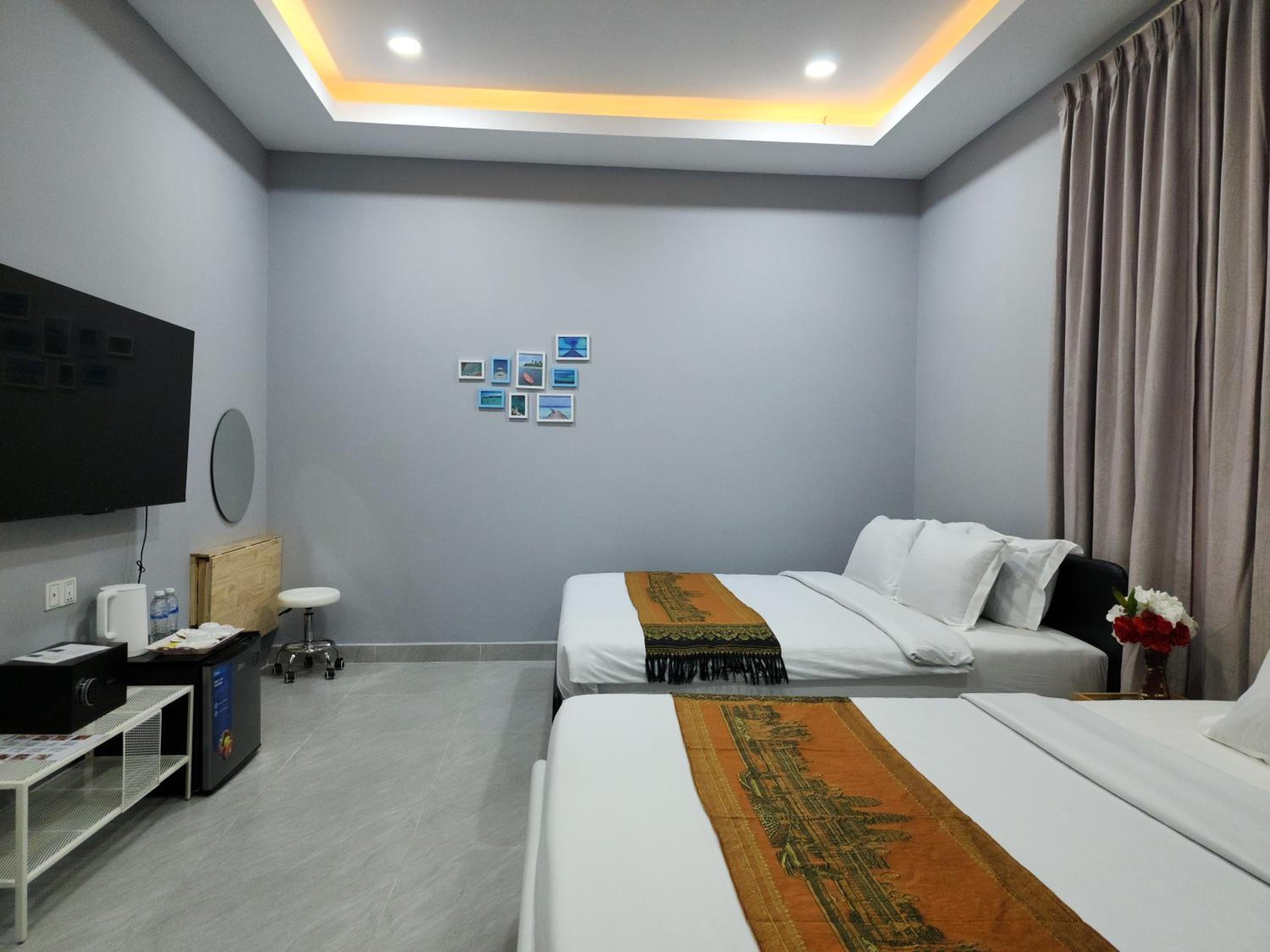 Deluxe Twin Room - Photo 11