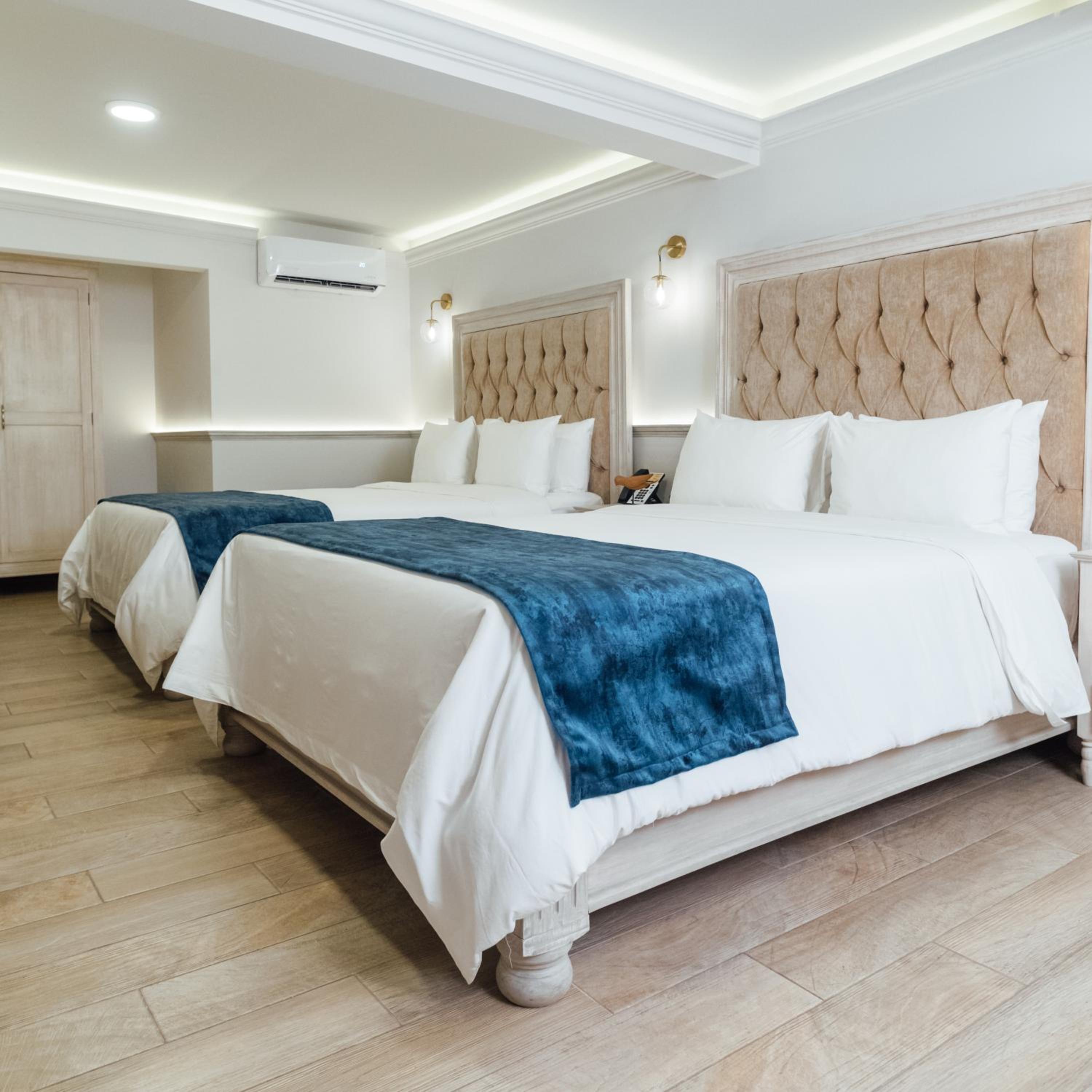 Queen Suite with Two Queen Beds - Photo 10