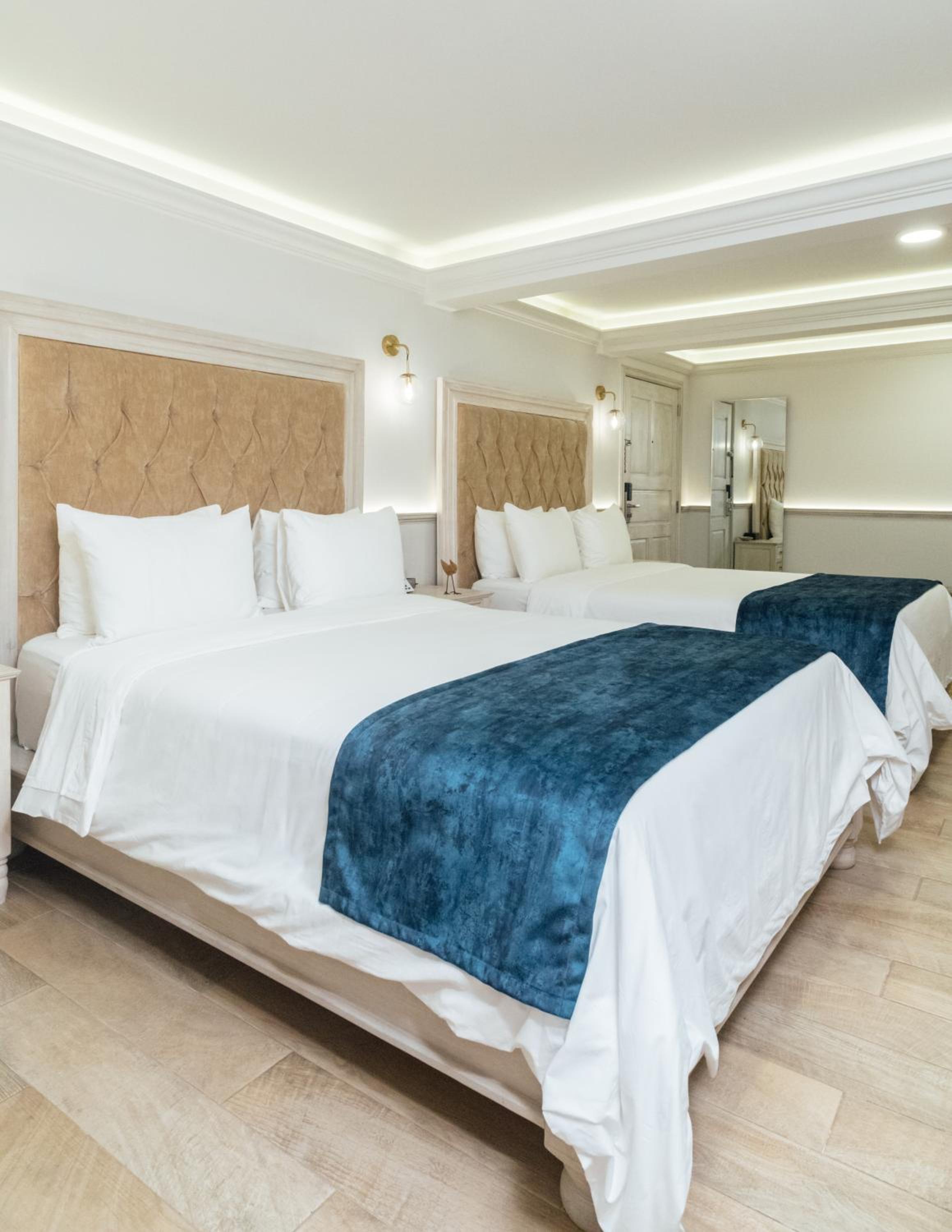 Queen Suite with Two Queen Beds - Photo 1