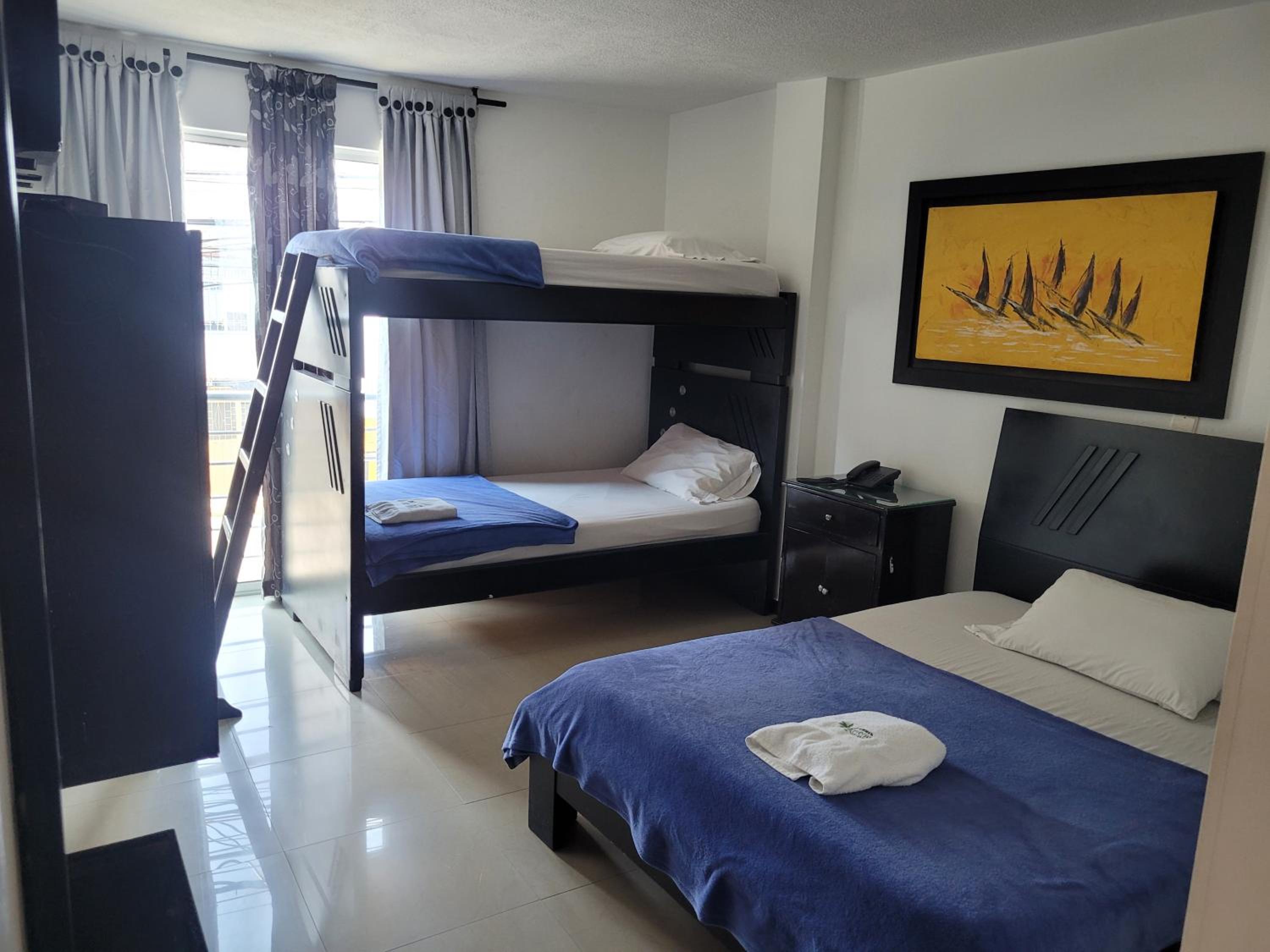 Quadruple Room with Balcony photo 1