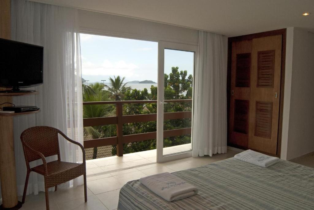 Double or Twin Room with Side Sea View photo 2