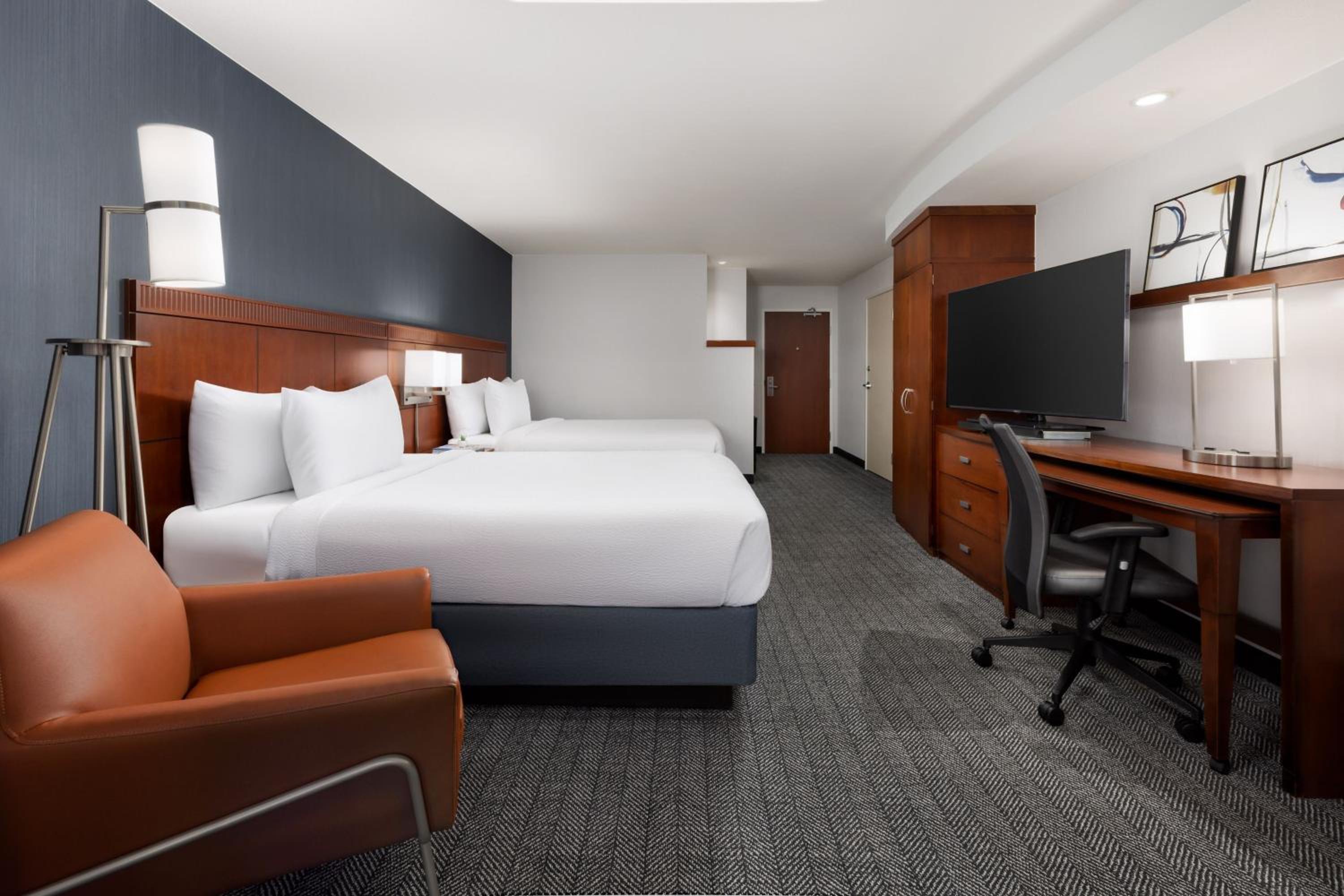 Queen Room with Two Queen Beds - Photo 1