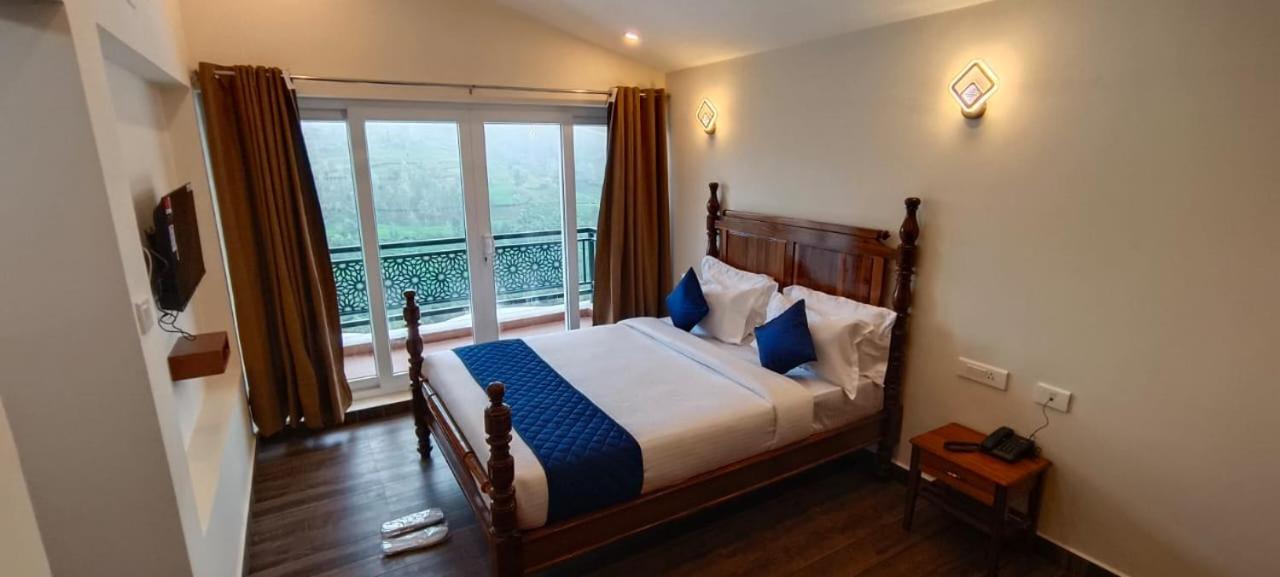 Deluxe Room - Photo 1