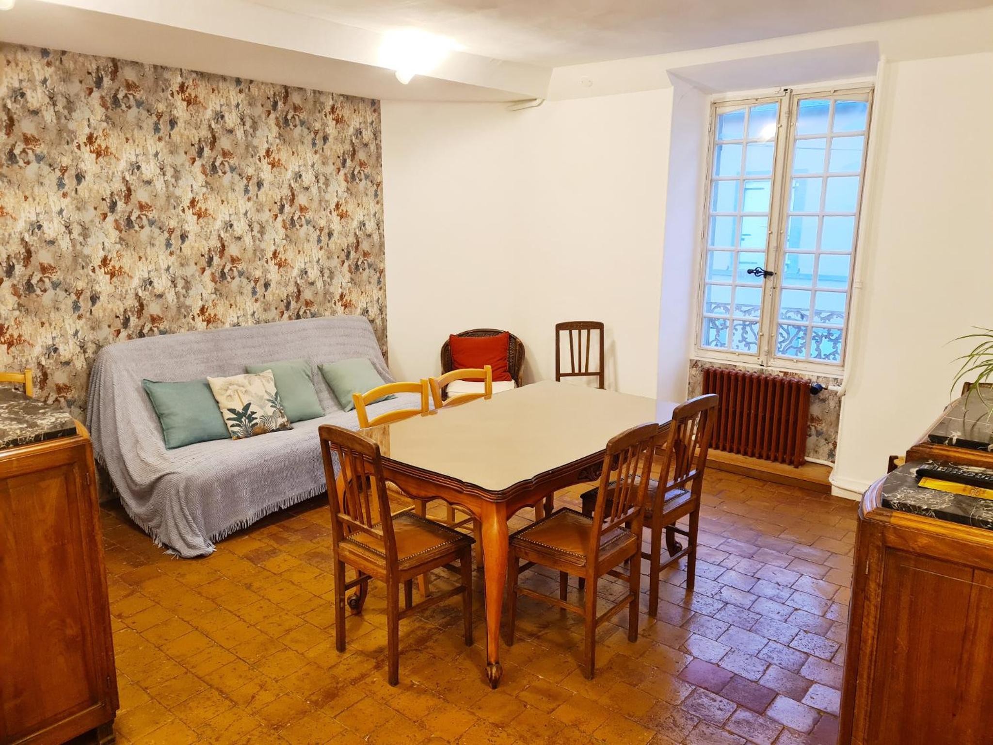 Three-Bedroom Apartment - Photo 2