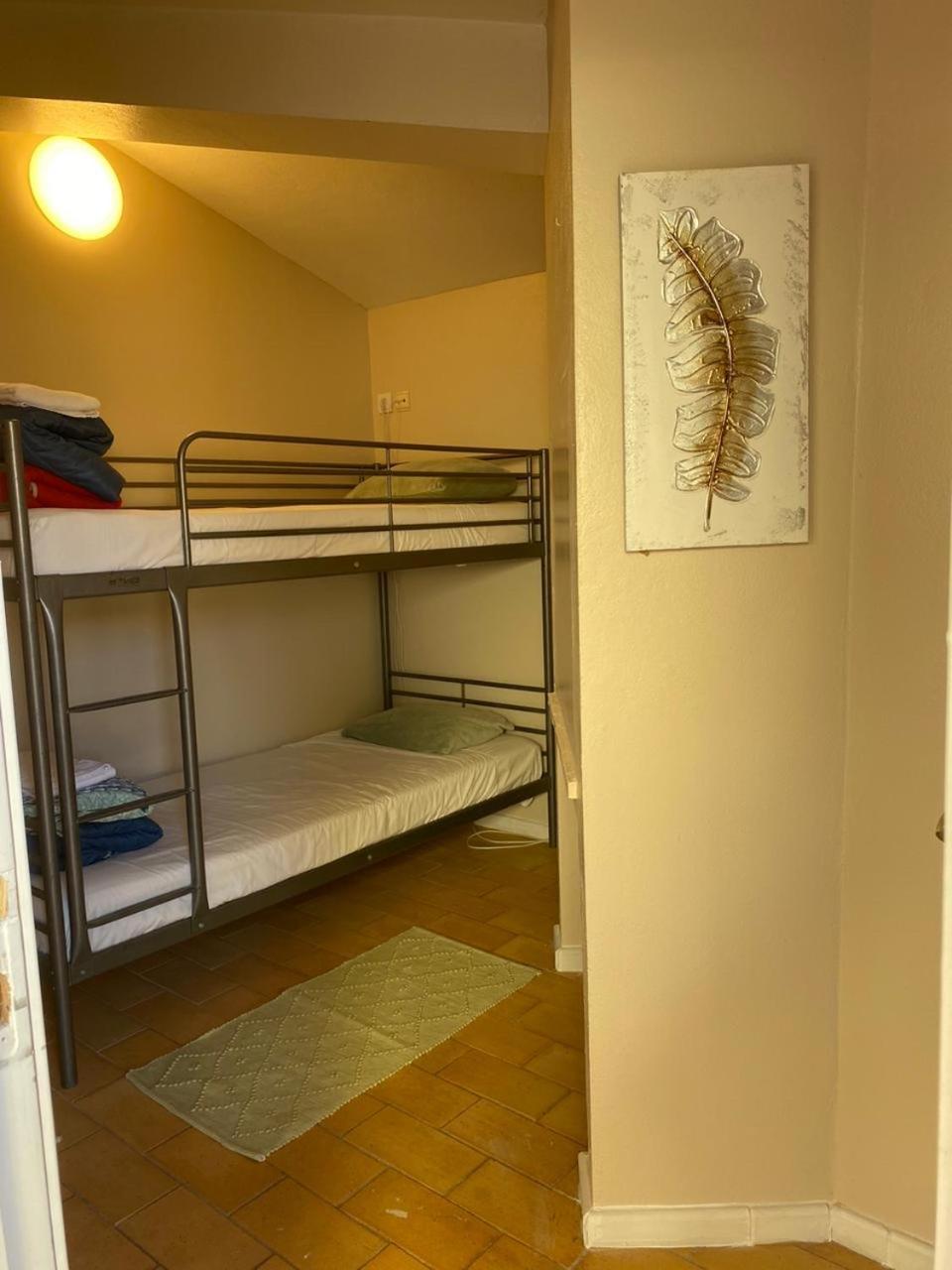 Single Bed in Dormitory Room