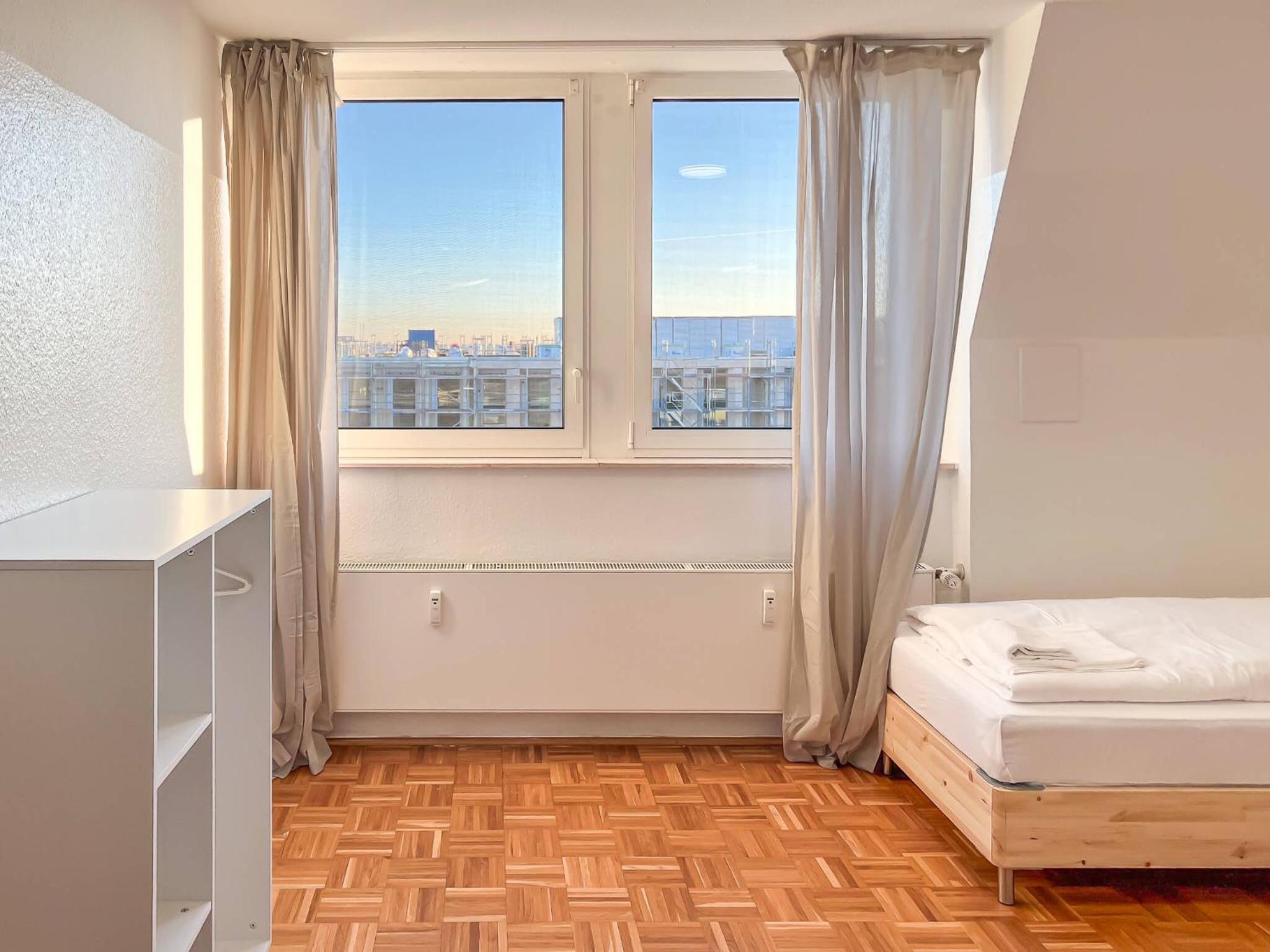Three-Bedroom Apartment photo 1