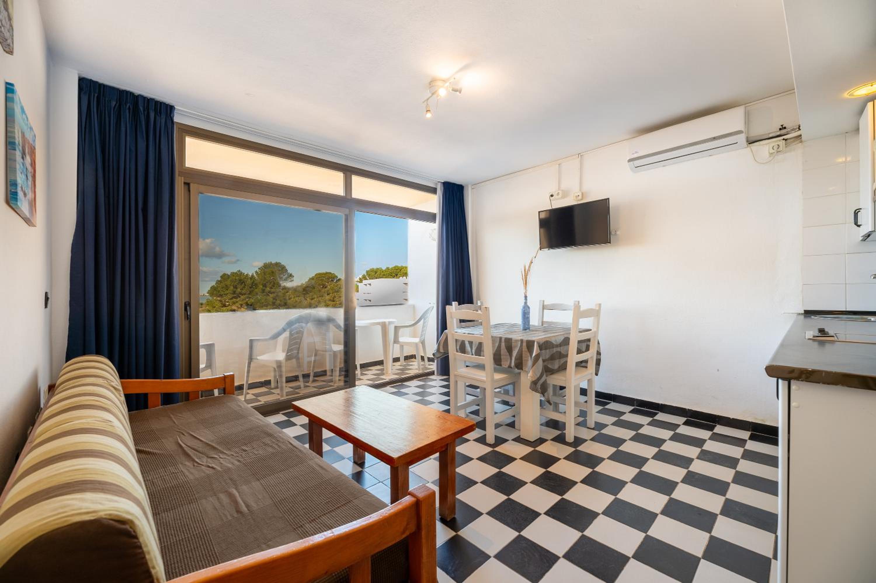 Apartamento de un dormitorio superior con balcón