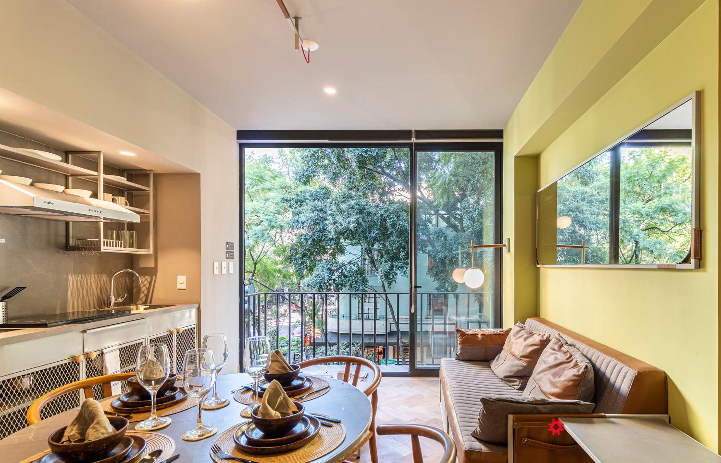 One-Bedroom Apartment with Balcony and City View - Photo 22
