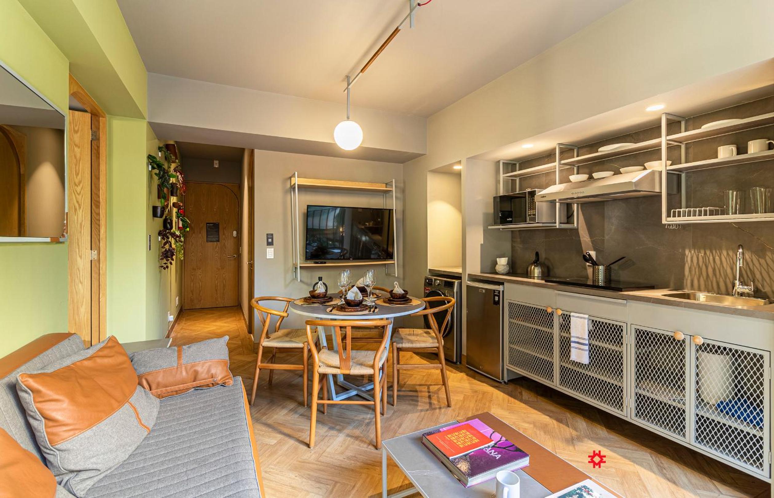 One-Bedroom Apartment with Balcony and City View - Photo 14